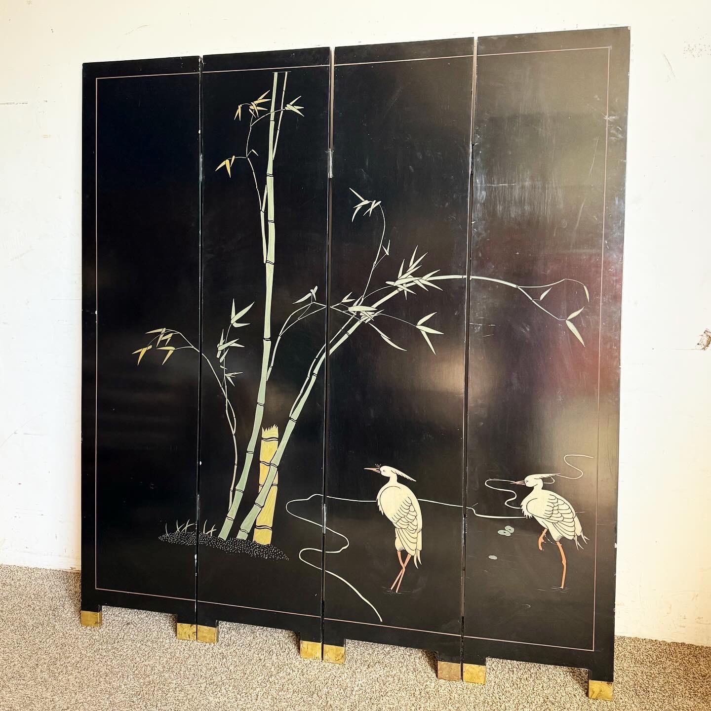 Discover the traditional craftsmanship of this Chinese Black Carved and Hand Painted Room Divider. Featuring four panels, this piece showcases intricate carvings and vibrant depictions of birds and flowers, set against a deep black background. The