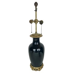 Antique Chinese Black Glazed Porcelain Lamp With Gilt Metal Mounts