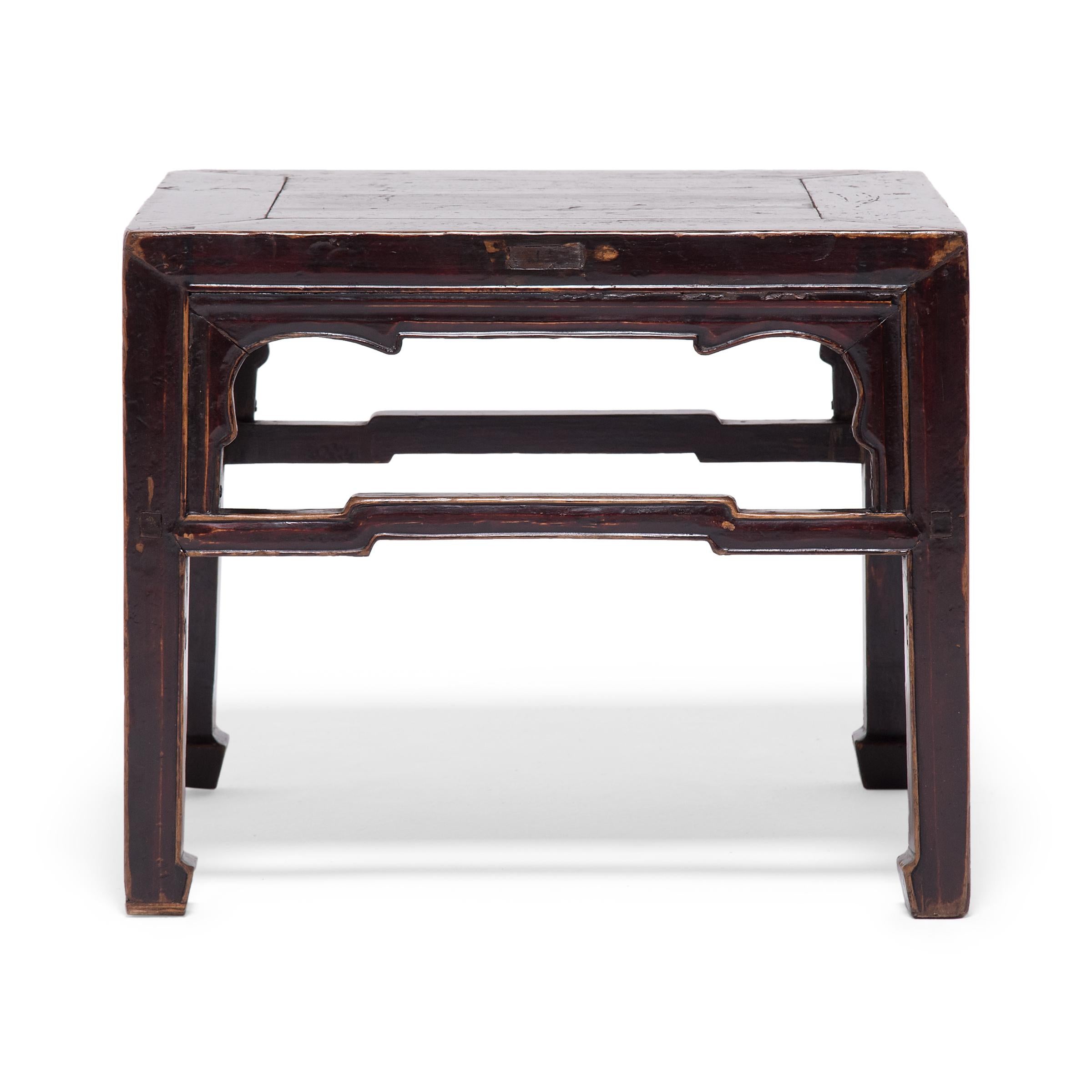 Stools have been a favored form of seating in Chinese culture for centuries and were used indoors and out at mealtimes and during social gatherings. This style of low square stool is known as a fang deng, and doubles as a low table for displaying