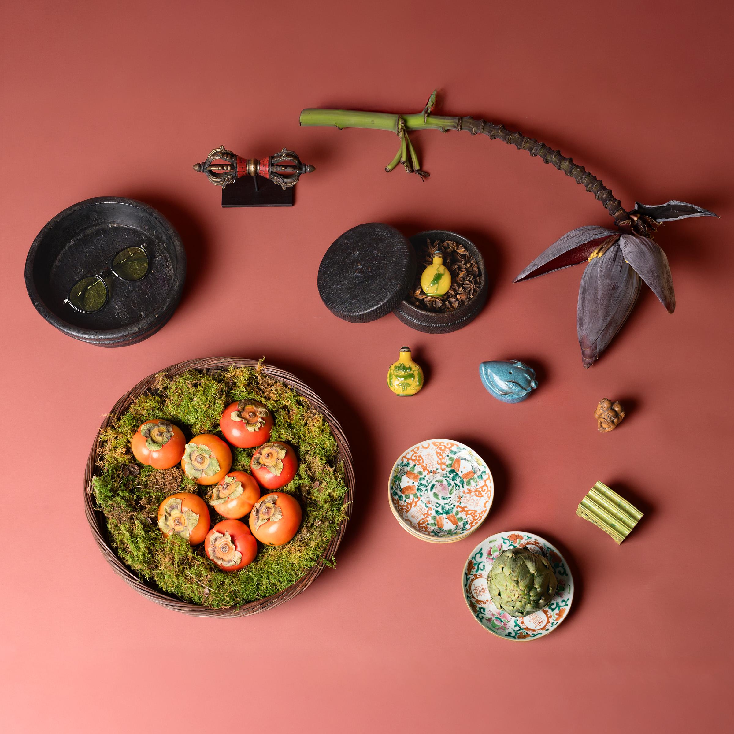 This small woven box from the early 20th century celebrates the beautiful simplicity of a hand-woven object. The round, lidded box is shaped from tightly woven reeds or bamboo and finished with a thick coating of thayo, a mixture of black lacquer