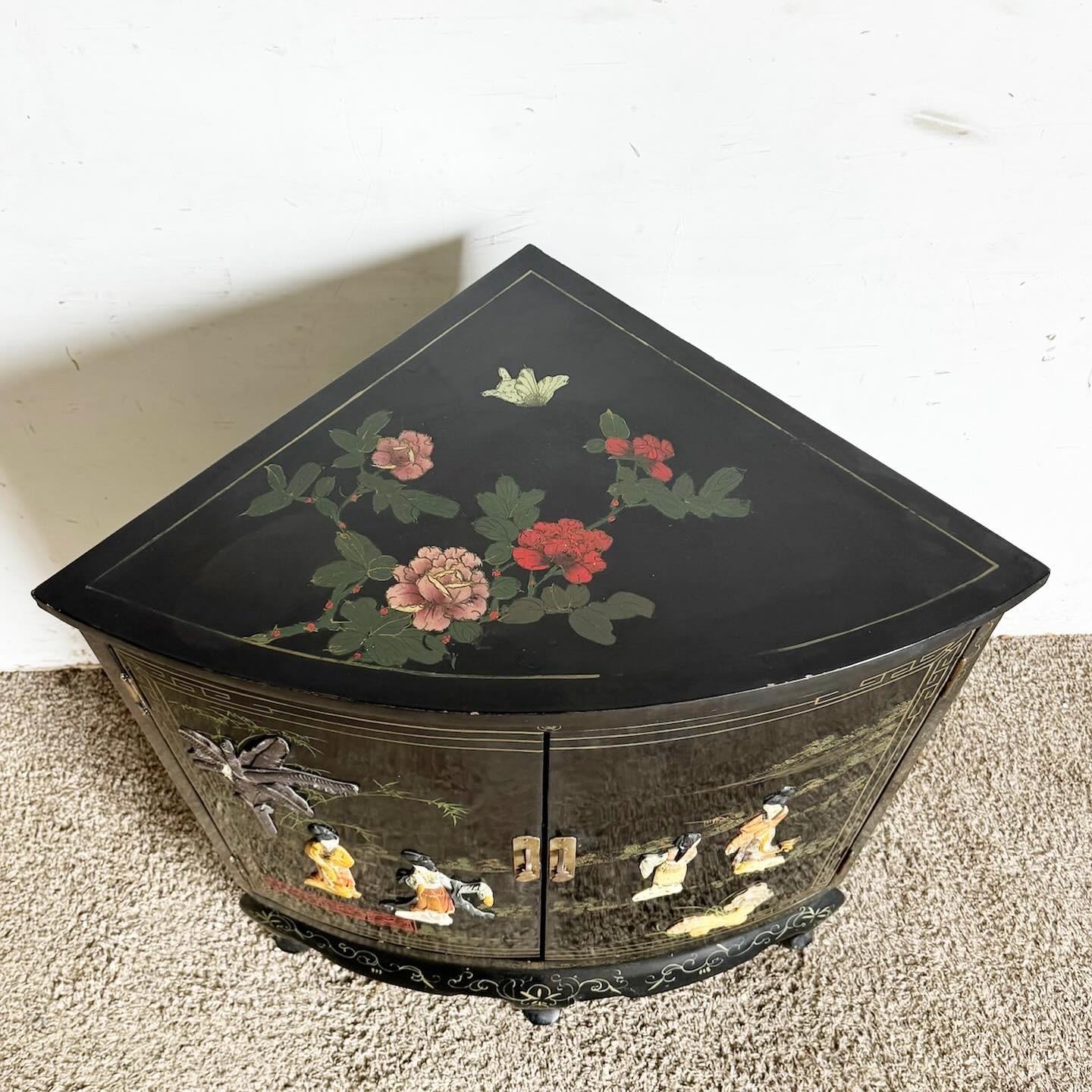 Discover the elegance of traditional Chinese craftsmanship with the Black Lacquered and Hand Laminated Demi Lune Cabinet/Side Table. This piece combines a sleek black lacquered finish with intricately detailed hand-laminated motifs, offering both
