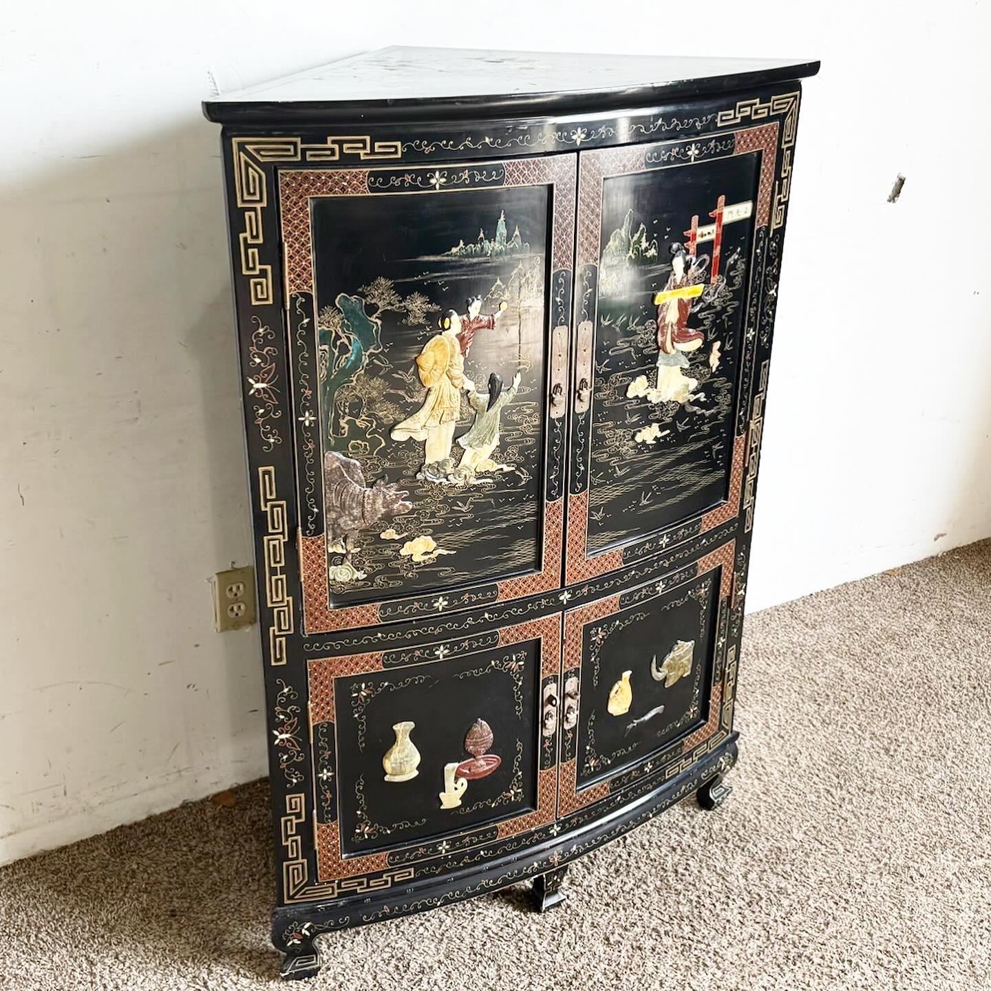 Discover the elegance of traditional Chinese craftsmanship with the Chinese Black Lacquered and Hand Painted Demi Lune Cabinet. Its elegant demi lune shape, enhanced with a rich black lacquer and intricate hand-painted designs, embodies the beauty