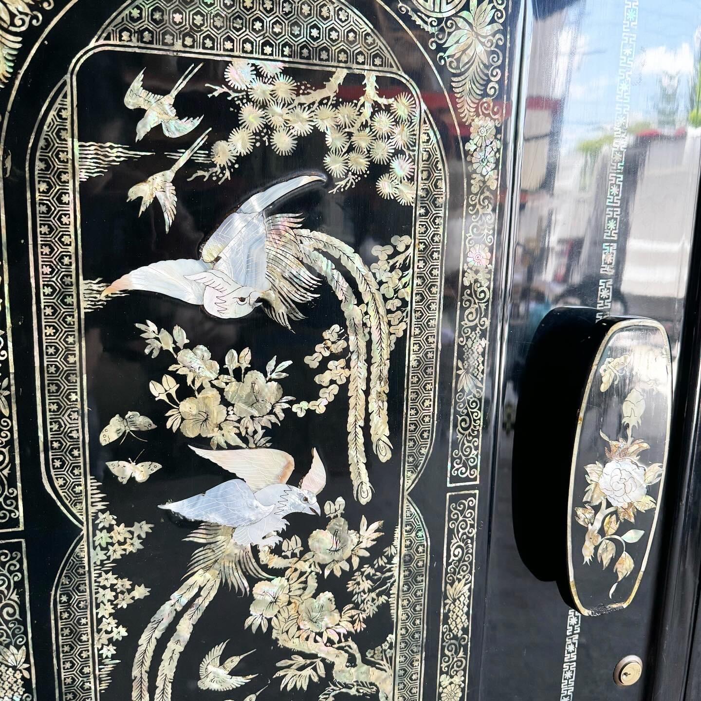 Chinese Black Lacquered and Mother of Pearl Inlay Armoire/Closet In Good Condition In Delray Beach, FL