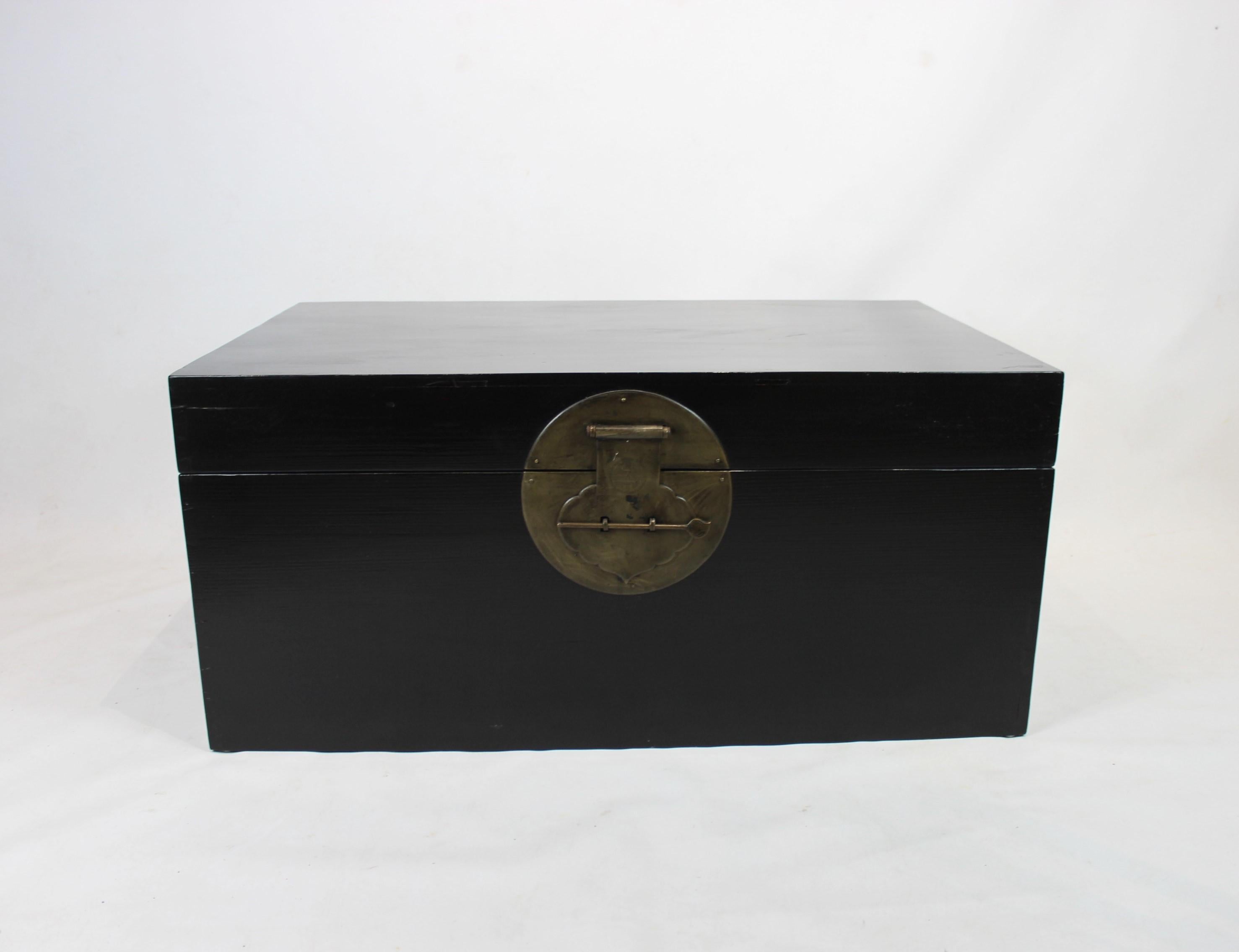 Chinese black lacquered chest from the 1940s. The chest is in great antique condition.