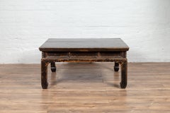 Chinese Black Lacquered Coffee Table with Weathered Patina and Horse-Hoof Legs