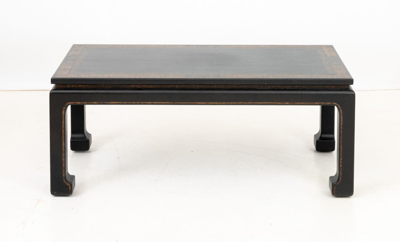 Chinese Black Lacquered Kang Table, the rectangular top with floral gilt border. 
19.75