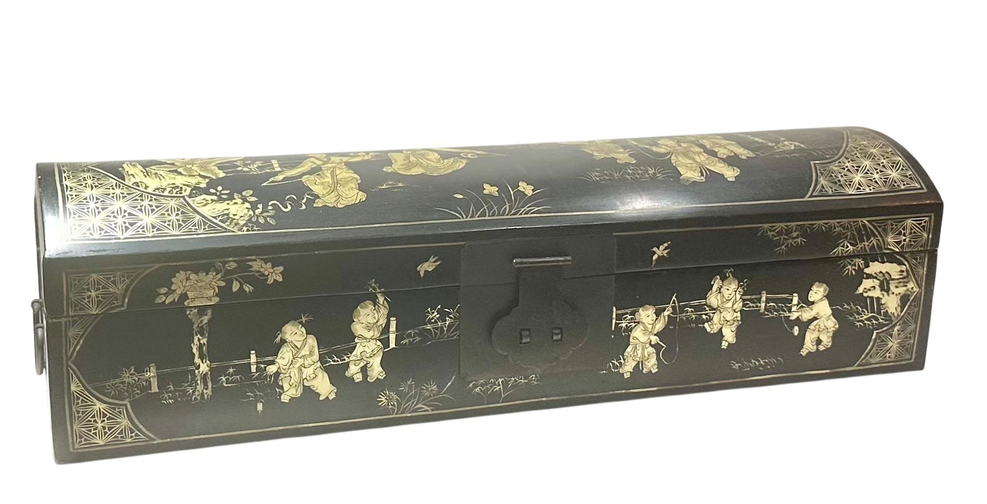 An elegant 1920s Chinese black papier-mâché lacquer box, featuring a rectangular form with a rich black lacquer finish. The front is adorned with a brass fitting designed to accommodate a lock, key and lock not included.