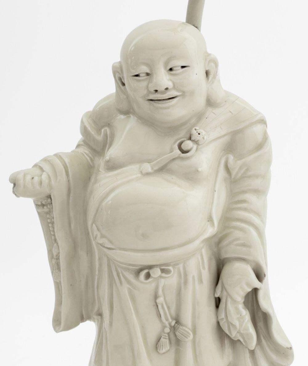 Chinese Blanc de Chine Buddha Sculpture Mounted as a Lamp, atop rockwork carved giltwood base. Overall: 17.5