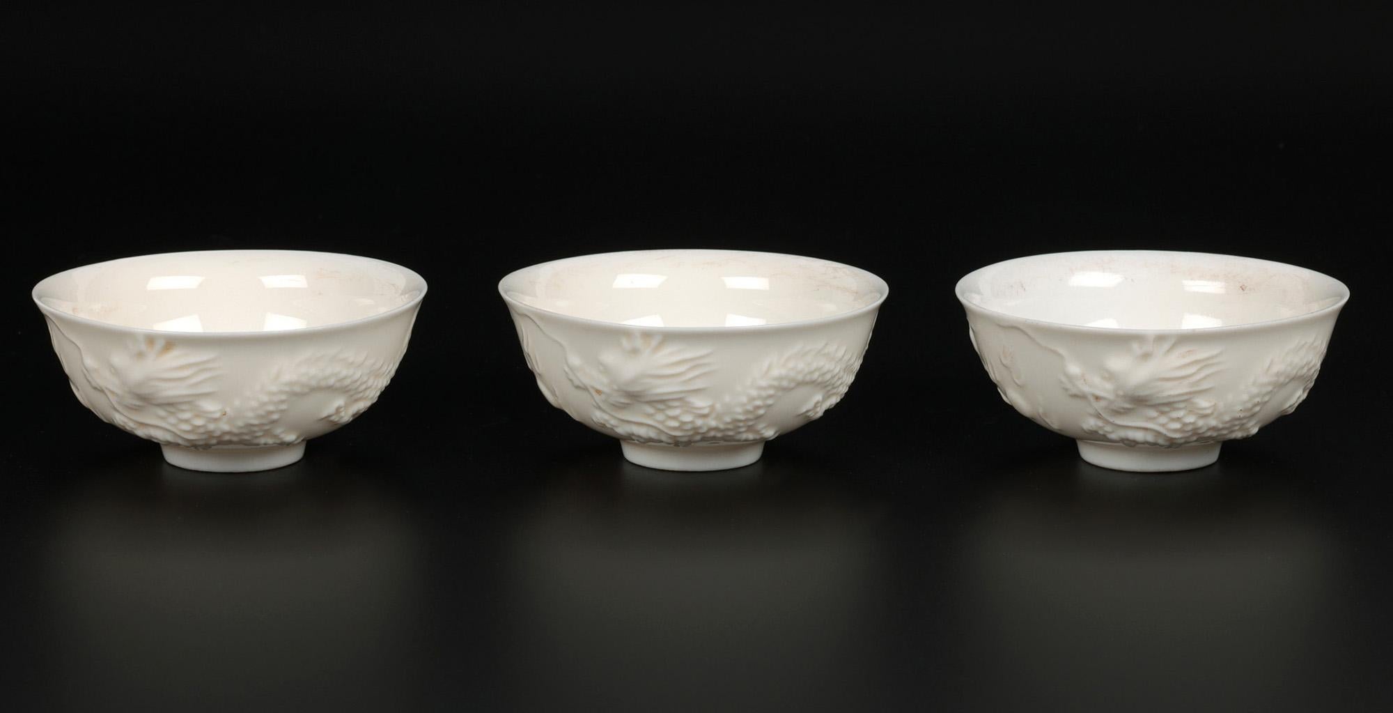 Chinese Blanc de Chine Dueling Dragon Molded Tea Bowls For Sale 4