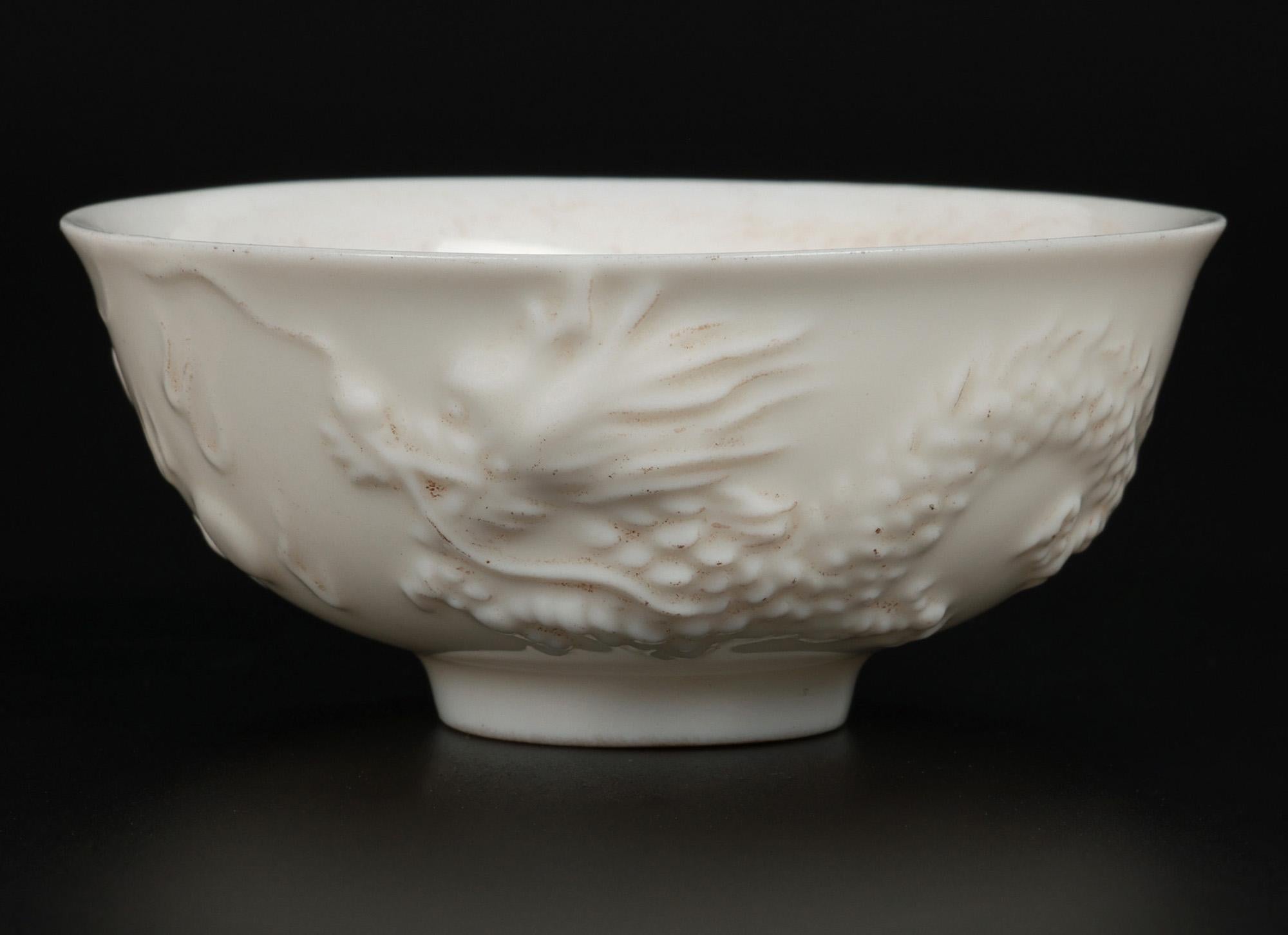 Chinese Blanc de Chine Dueling Dragon Molded Tea Bowls For Sale 1