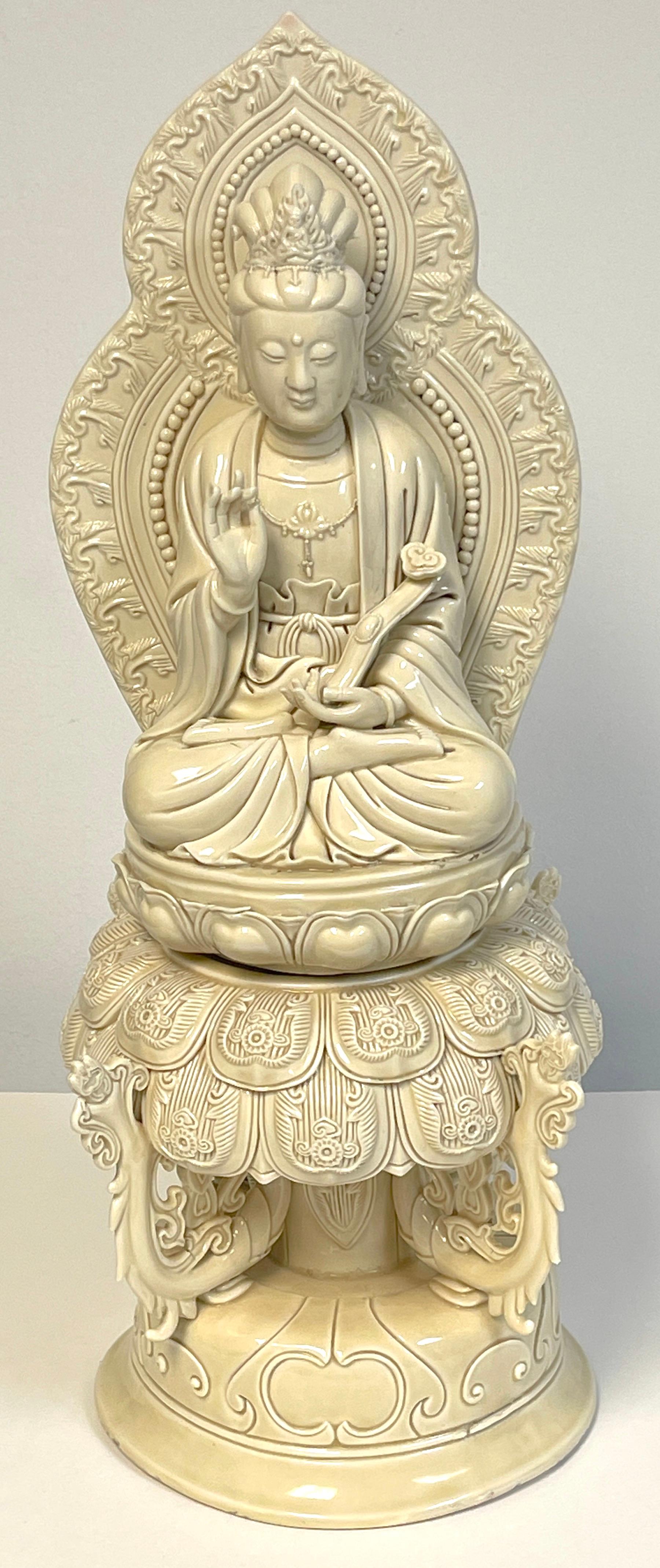 Chinese Blanc-de-Chine Seated Guanyin Altar Piece , 19th/20th Century

A large and impressive work, in two parts bearing seal/reign mark on the back of the mandala.

The serene bodhisattva in front of a pagoda shaped mandala, wearing an ornate
