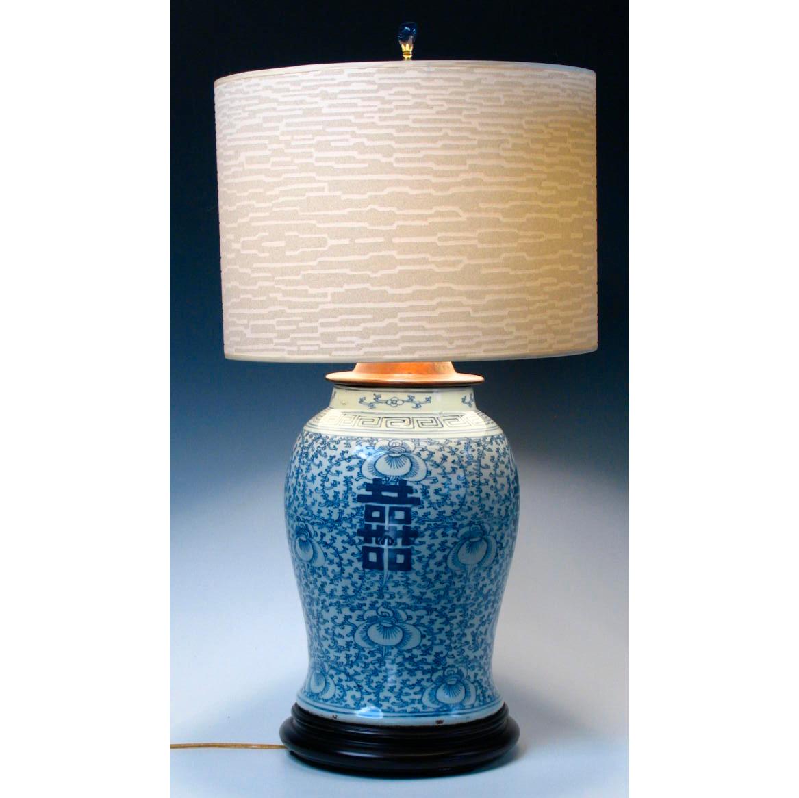 Chinese blue & white baluster vase fitted as a lamp. Ceramic vase with a cobalt blue under-glaze design of convolvulus bindweed, a symbol of love and marriage, with four bold hei (double happiness) characters, with key-fret pattern at the