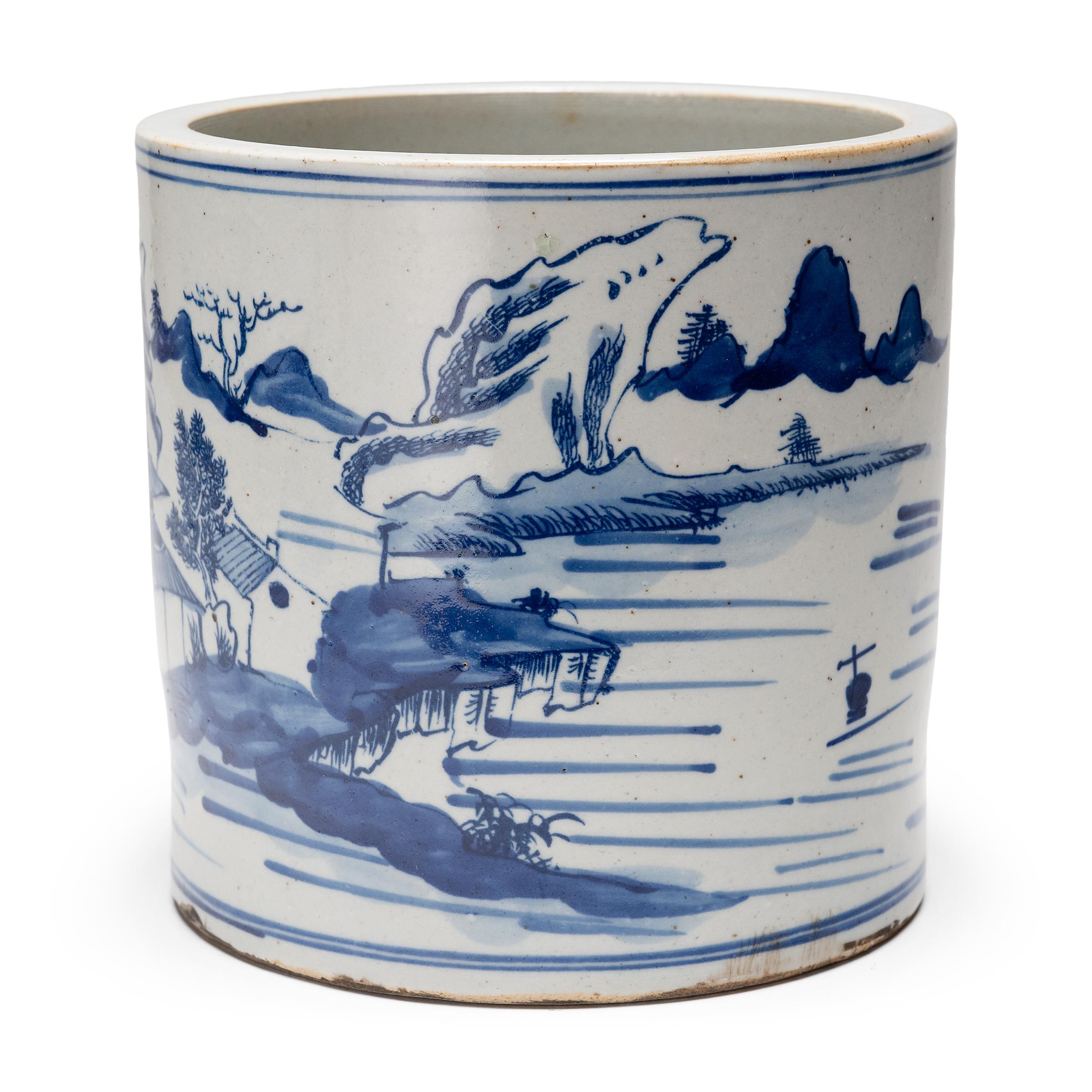 Set alongside the four treasures of the study - the calligraphy brush, ink, paper, and inkstone - a brush pot, or bitong, was an essential fixture of the scholars' desk. This porcelain brush pot beautifully exemplifies this traditional form with the