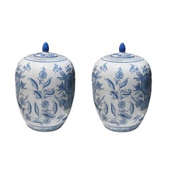 Chinese Blue and White Ceramic Lidded Floral Motif Ginger Jars or Urns, Pair