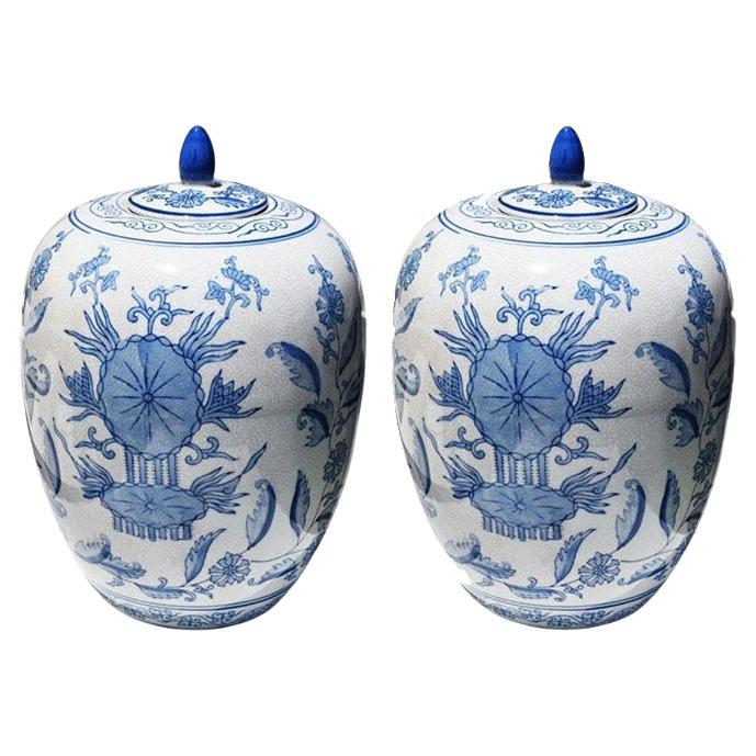 Chinese Blue and White Ceramic Lidded Floral Motif Ginger Jars or Urns, Pair 
