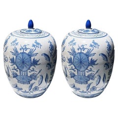 Vintage Chinese Blue and White Ceramic Lidded Floral Motif Ginger Jars or Urns, Pair 