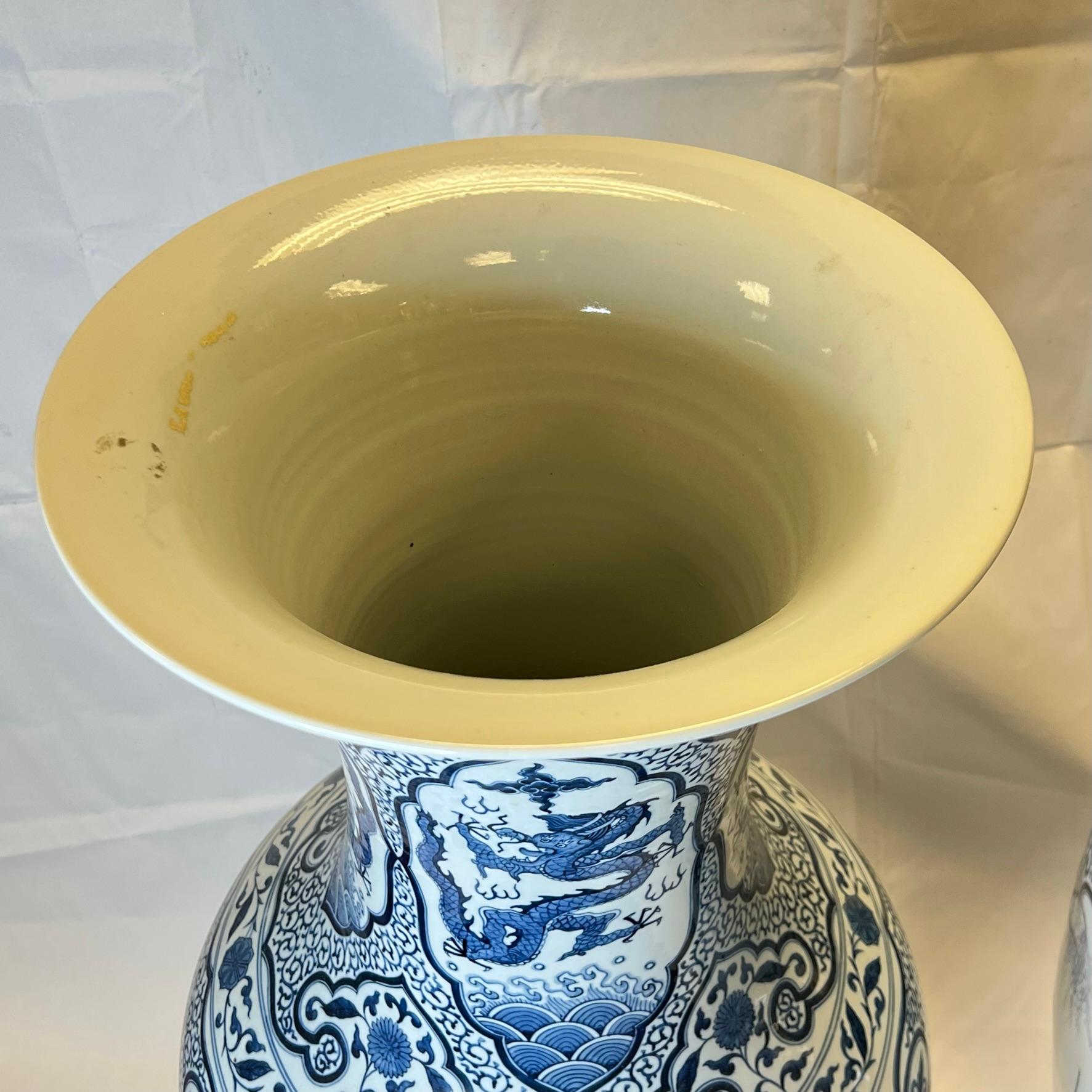Large (41 inch tall) Chinese blue and white export porcelain vase in the 18th Century Qianlong style. Underside with the Qianlong mark.
