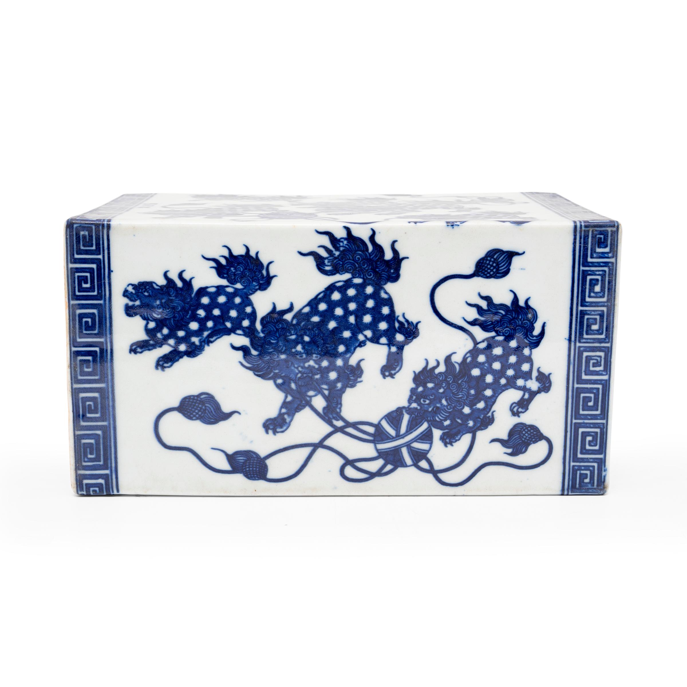 This large ceramic block is actually a form of Chinese headrest or neck pillow. Popular during the Qing dynasty, rigid headrests such as this were used by upper-class women to protect their elaborate hairstyles by elevating the head during slumber.
