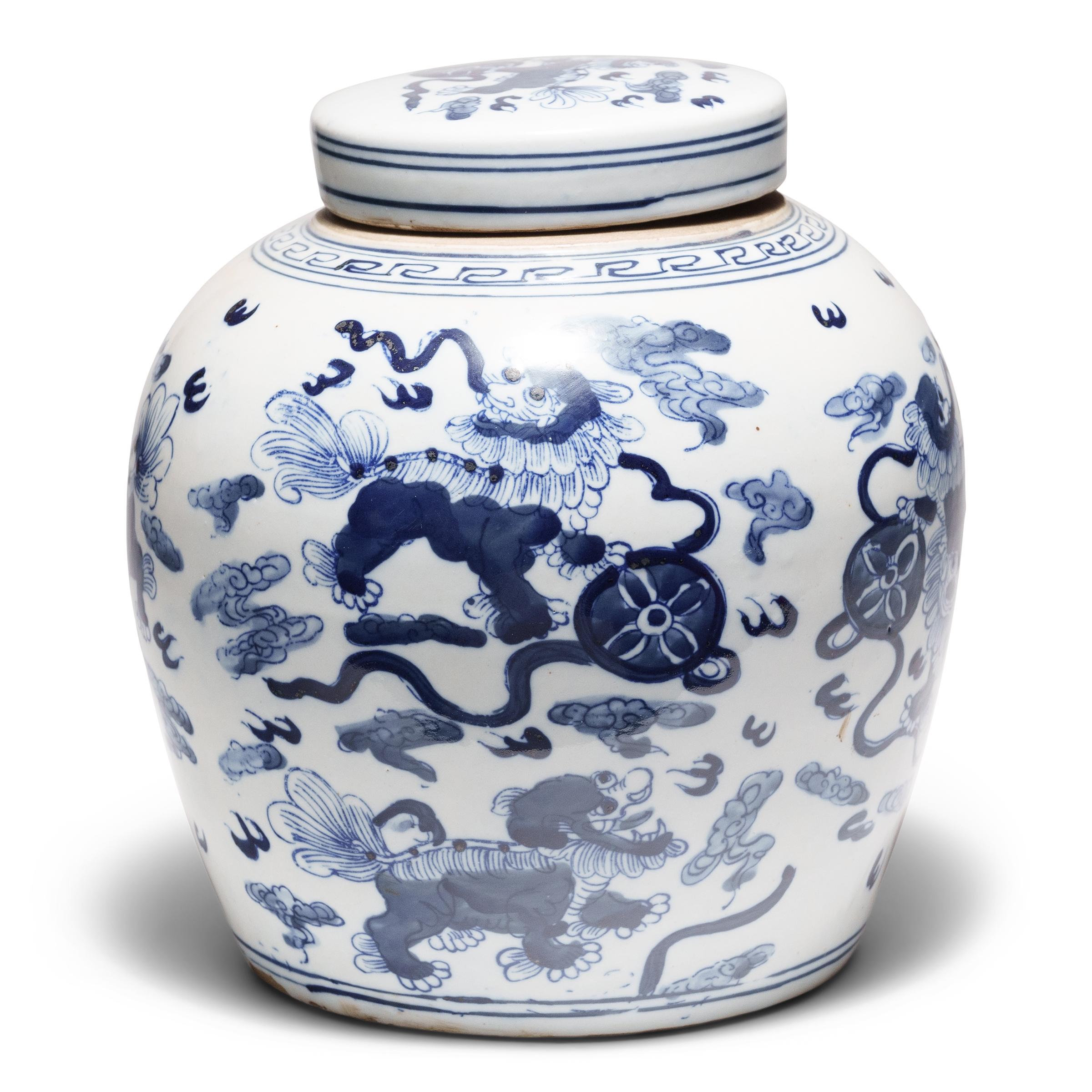 Glazed Chinese Blue and White Jar with Mythical Fu Lions For Sale
