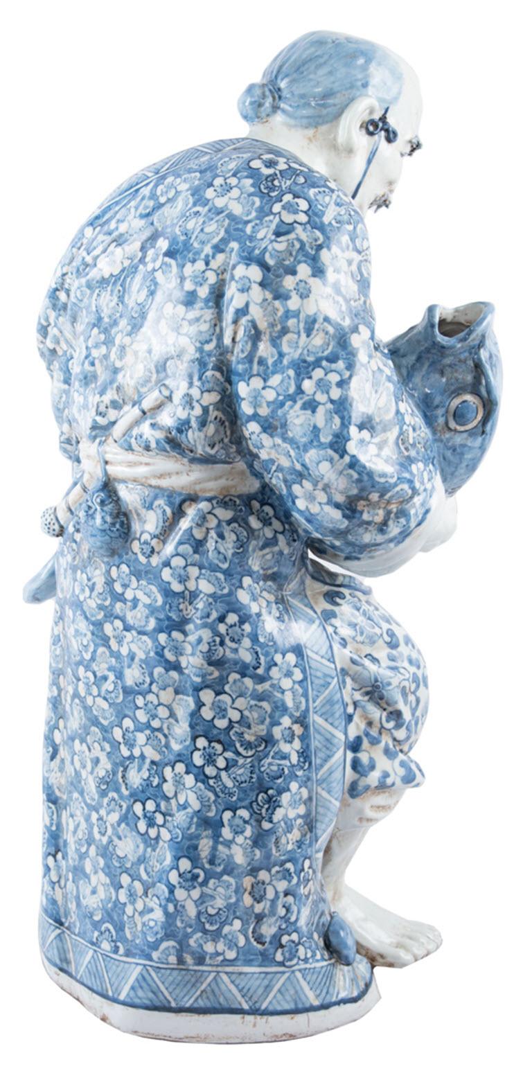 Chinese Blue and White Porcelain Figure of a Fisherman 4