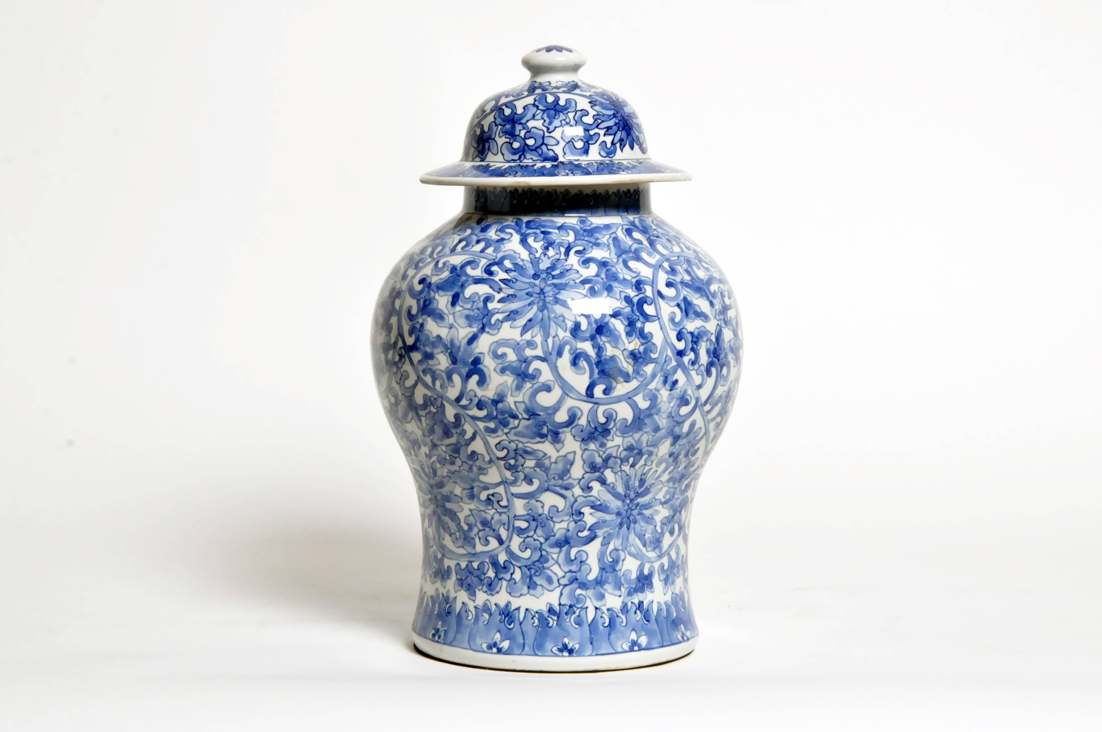 Beautiful contemporary blue and white ceramic vase from Shanxi, China to accent and add a pop of color to your space. Price is for each vase.