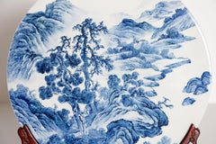 Chinese Blue and White Porcelain Plaque with a Carved Wooden Stand