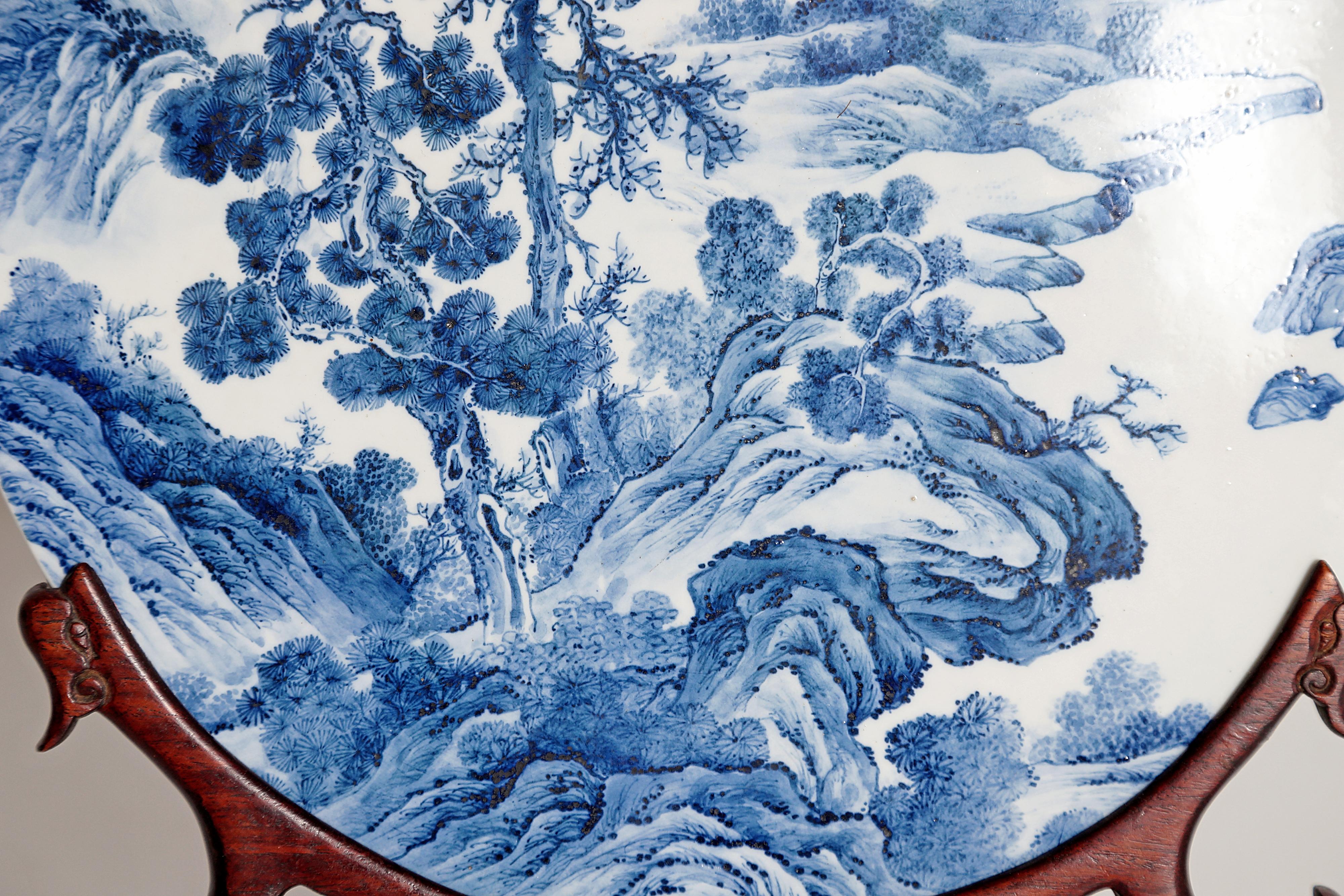 Hand-Carved Chinese Blue and White Porcelain Plaque with a Carved Wooden Stand