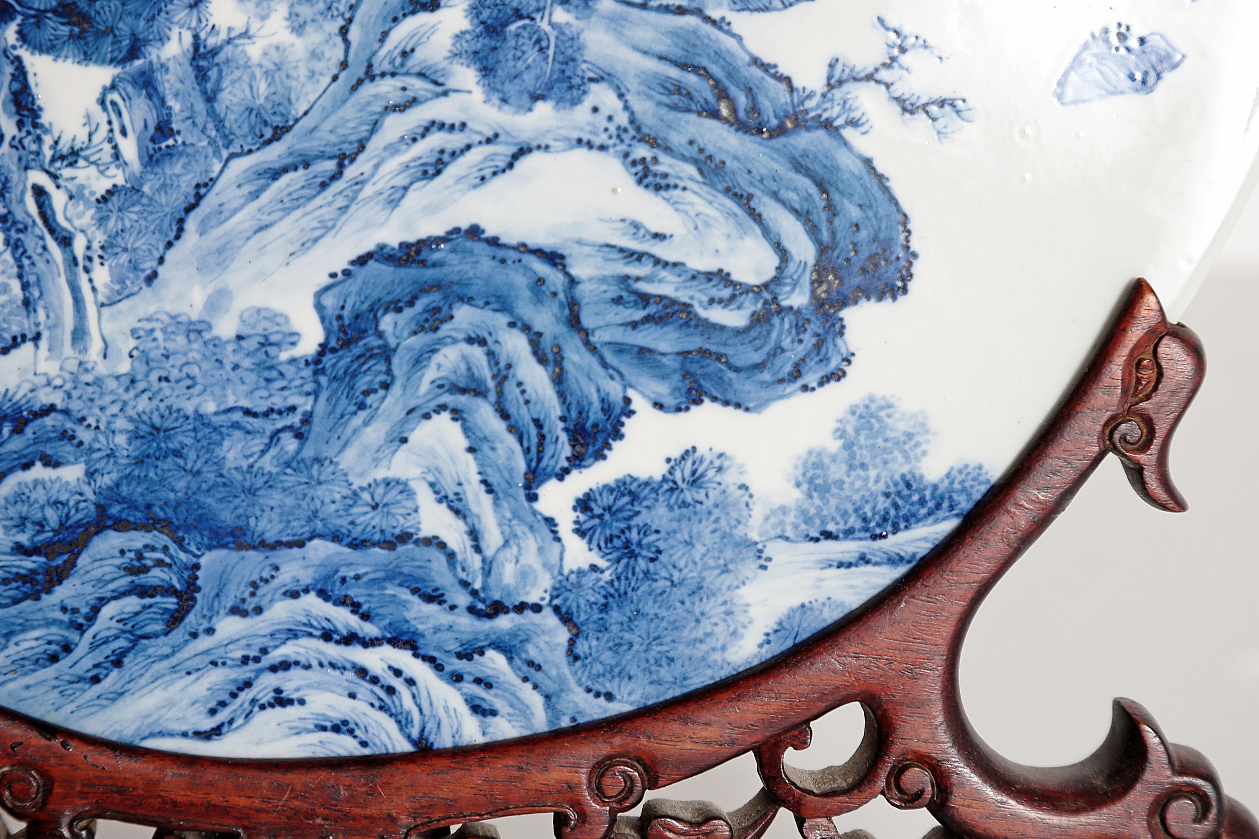 Chinese Blue and White Porcelain Plaque with a Carved Wooden Stand In Good Condition In Dallas, TX