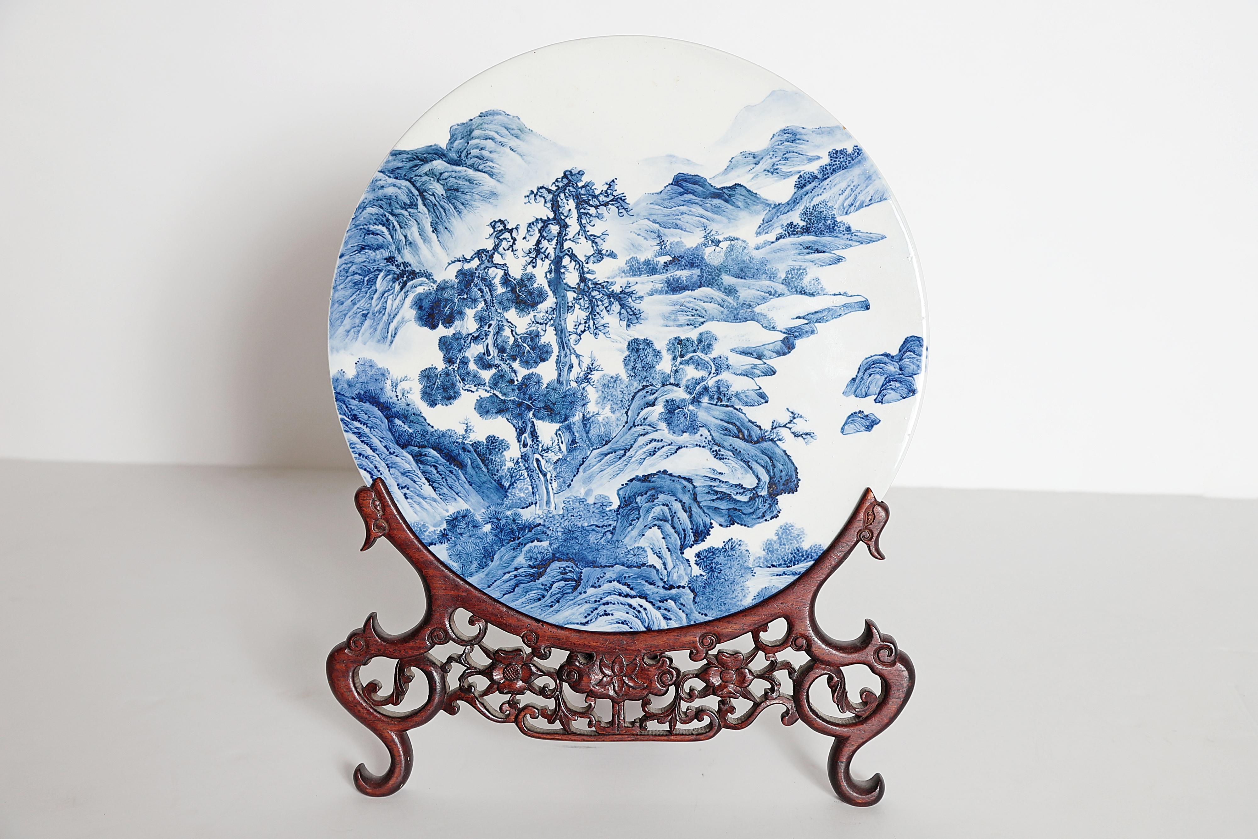 Chinese Blue and White Porcelain Plaque with a Carved Wooden Stand 1