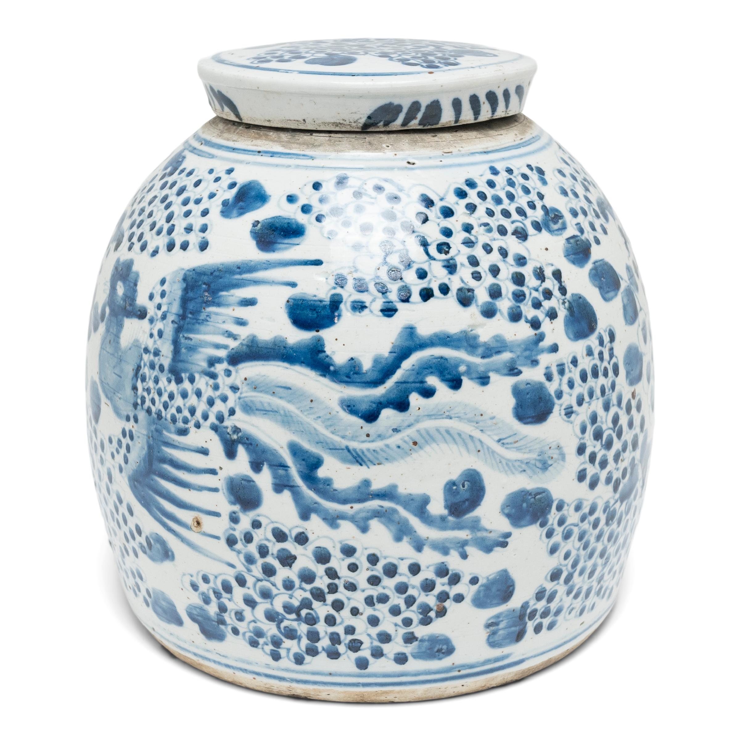 Brushed with dark cobalt blue atop a creamy white field, this Qing-dynasty tea leaf jar beautifully exemplifies the timeless allure of blue-and-white porcelain. The tea jar has a gently tapered form with a wide base and high shoulders that flow into
