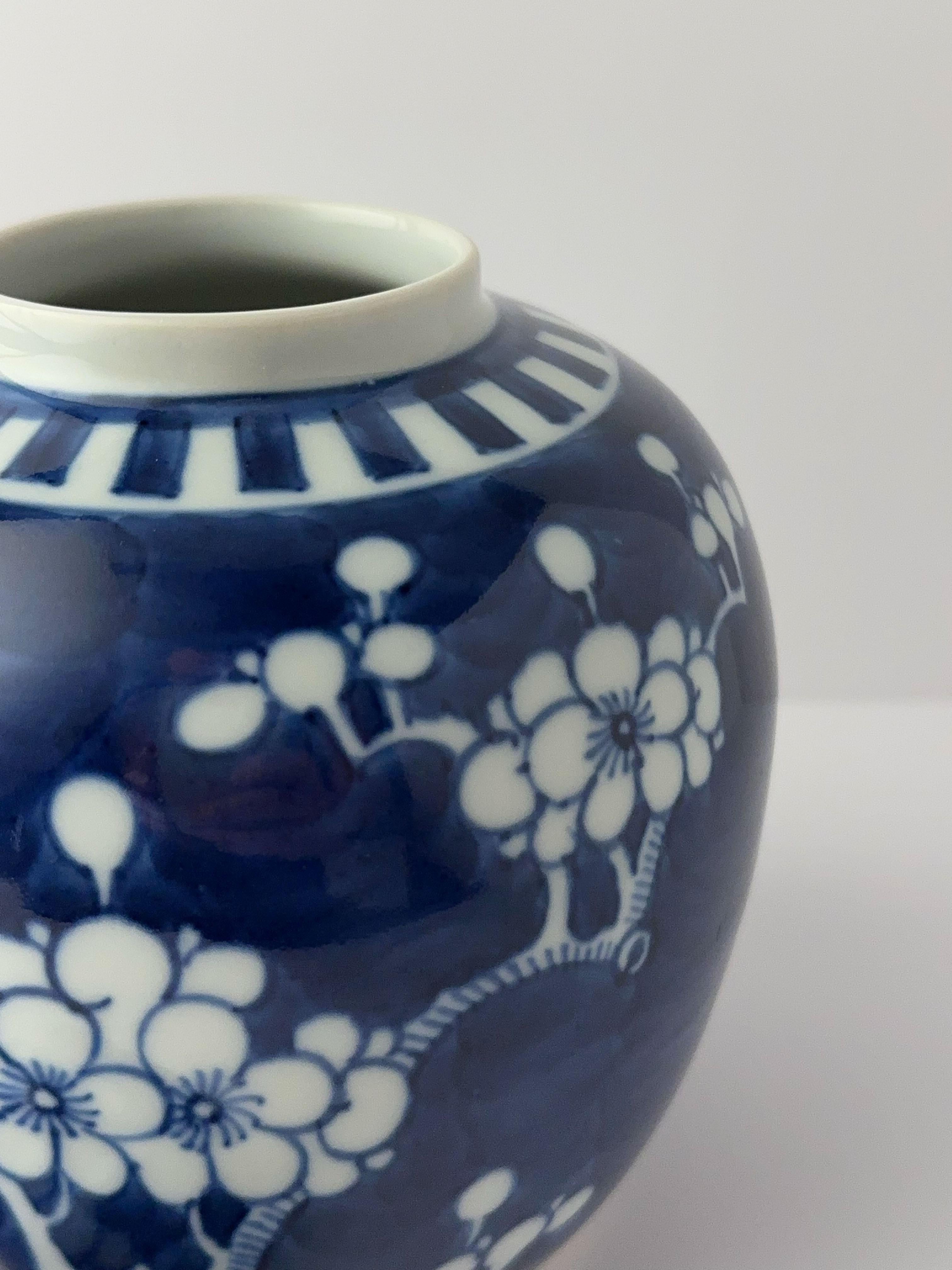  Kangxi style blue and white underglaze porcelain ginger jar.

A reproduction of the ‘Kangxi’ blue and white ‘prunus’  ginger jar, crafted in the late 1980s in China 

Hand painted in blue enamels set against a white underglaze porcelain. Decorated