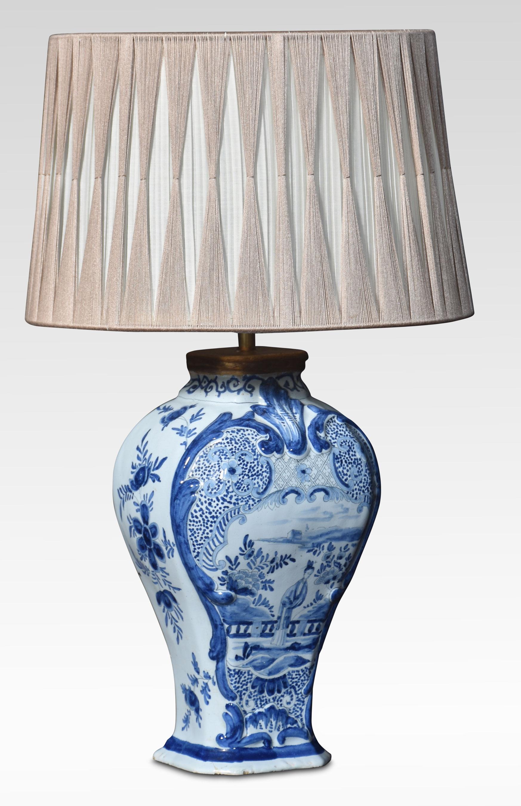 Chinese blue and white vase lamp decorated with oriental scenes and foliage. The lamp has had some repairs.
Dimensions
Height 15.5 Inches
Width 7.5 Inches
Depth 7.5 Inches