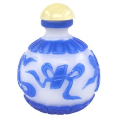 Chinese Blue Glass Overlay Globular Snuff Bottle Carved Buddhist Treasures 20c