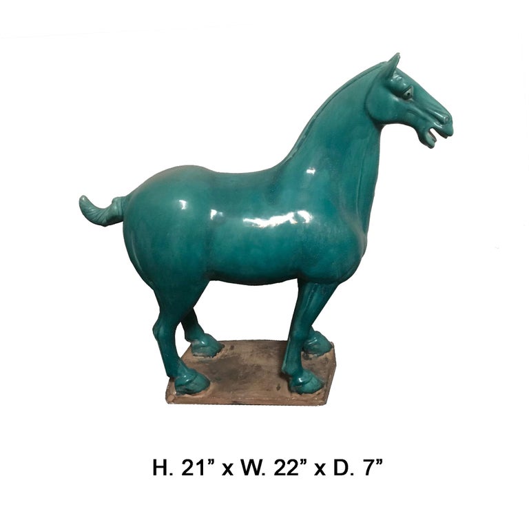 Attractive Chinese blue glazed pottery standing horse on rectangular pottery base with fine details, second half of the 20th century.
It would make a beautiful accent for decorators in modern or traditional homes.
Measures: H 21