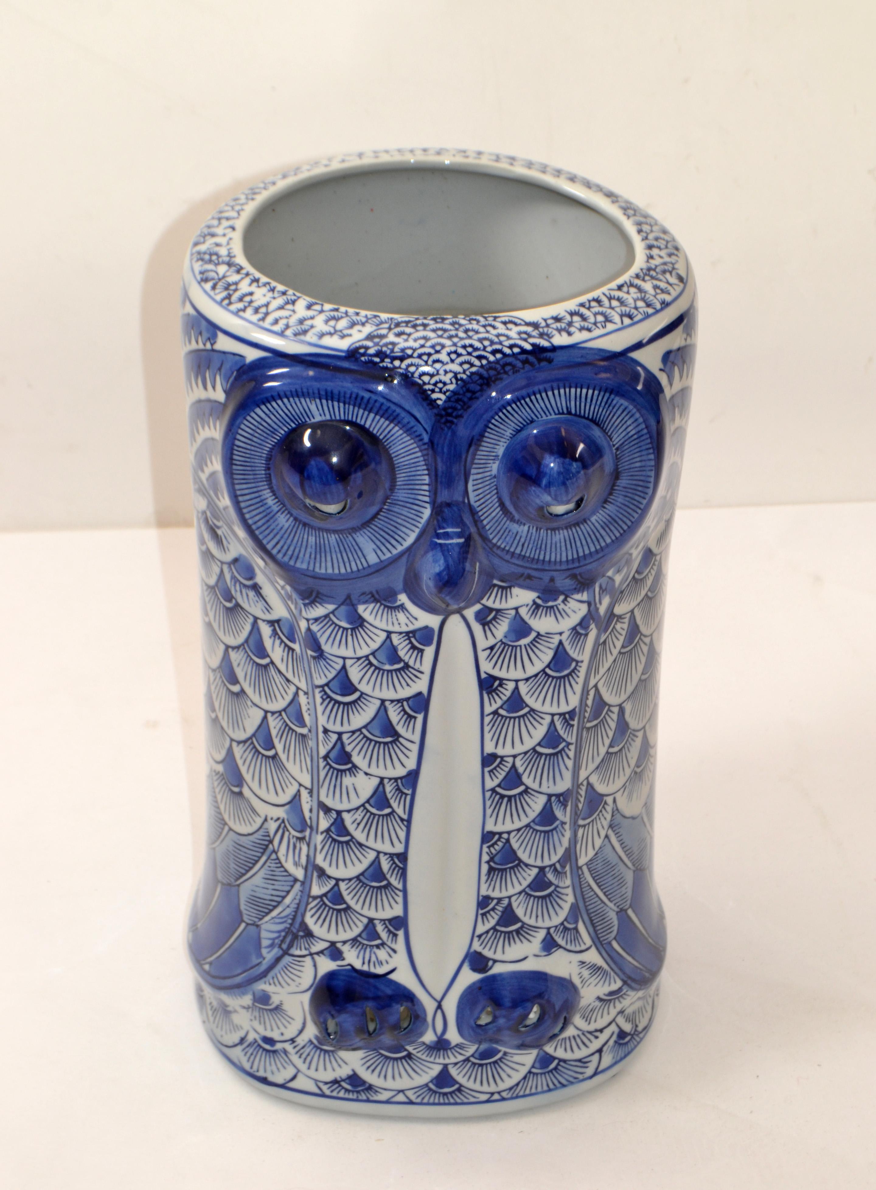 blue and white ceramic owl