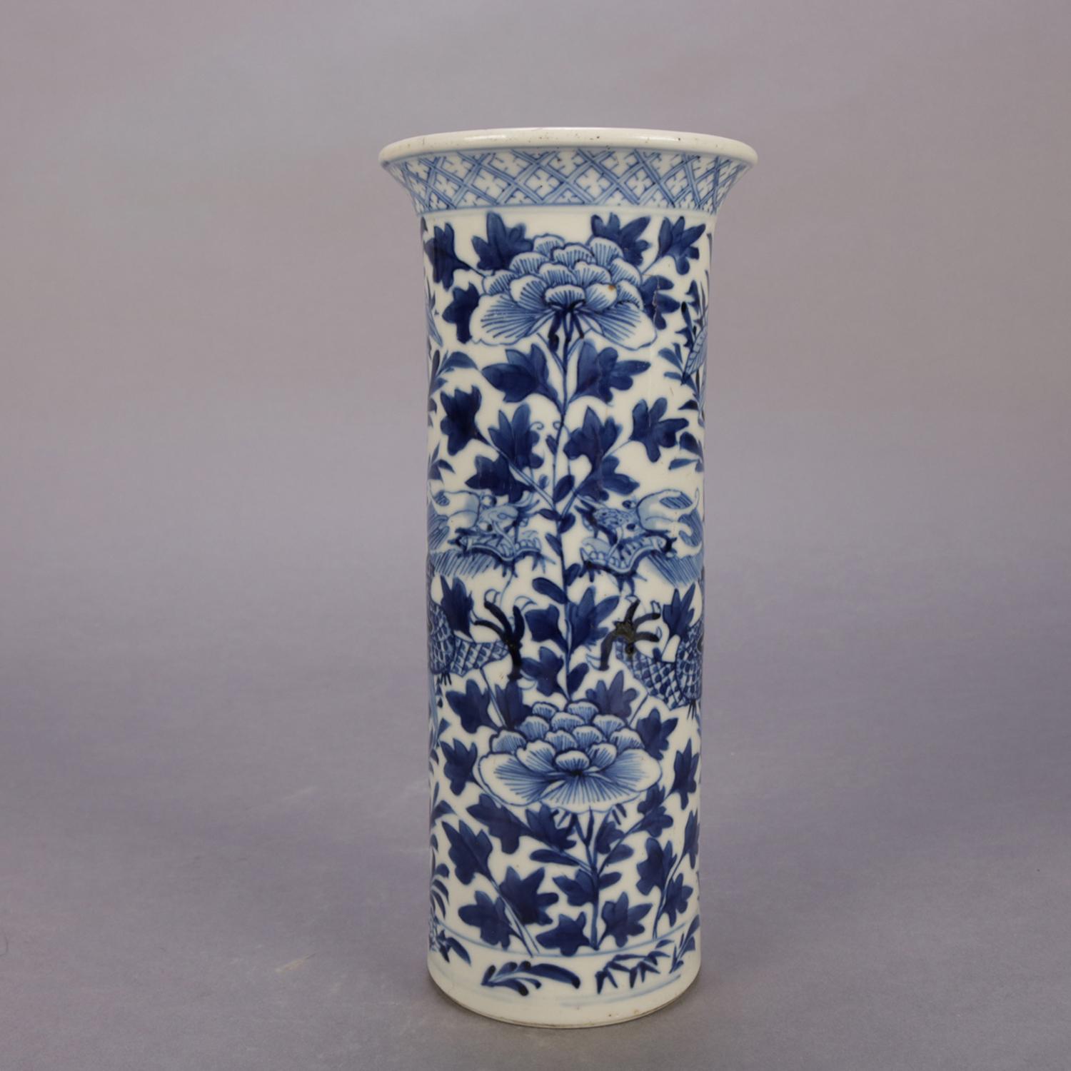 A Chinese blue and white Canton style porcelain vase features cylinder form with flared mouth and dragon and floral lotus decoration, chop mark signed on base, 20th century

Measures: 9.75