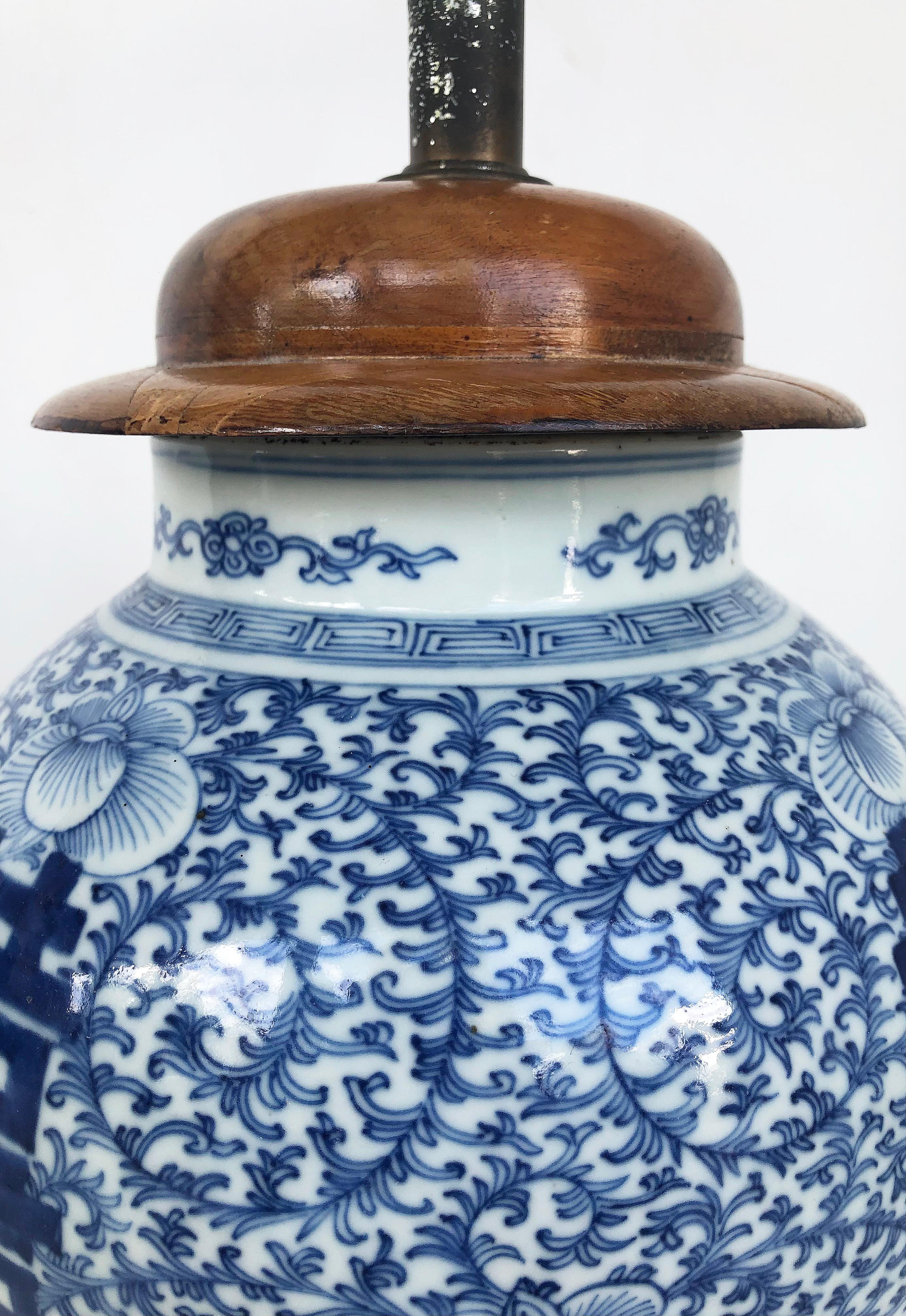 Glazed Chinese Blue & White Porcelain Ginger Jar Table Lamps with Ebonized Wood Stands