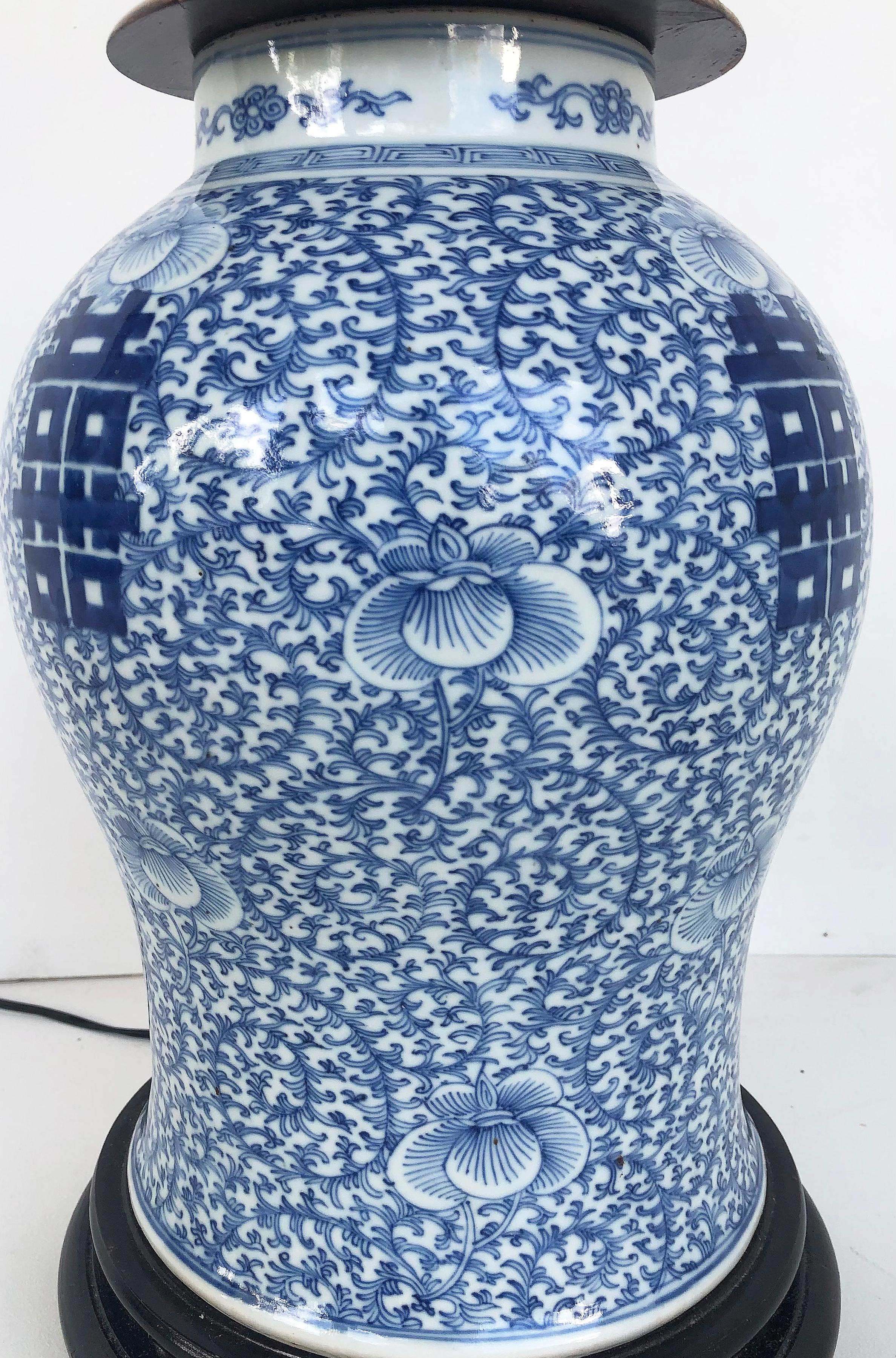 Chinese Blue & White Porcelain Ginger Jar Table Lamps with Ebonized Wood Stands In Good Condition In Miami, FL