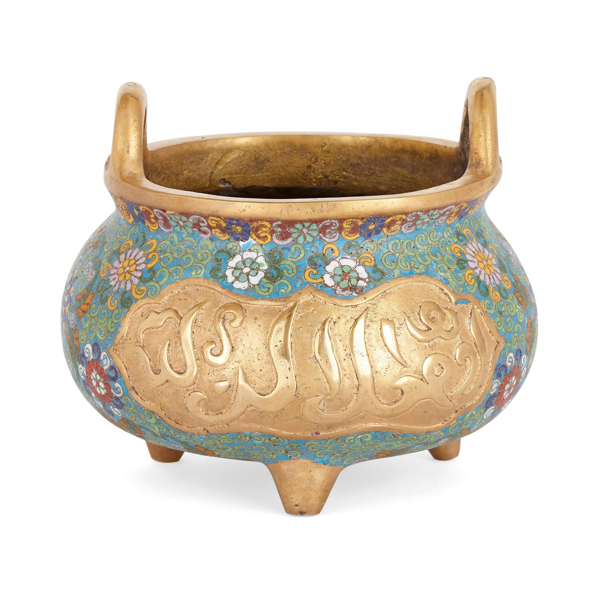 Chinese bowl adorned with cloisonné enamel and Arabic inscriptions
Chinese, early 20th century
Measures: Height 20cm, diameter 23cm

This beautiful bowl is a superb example of Chinese export ware designed for an Islamic market. The bowl is