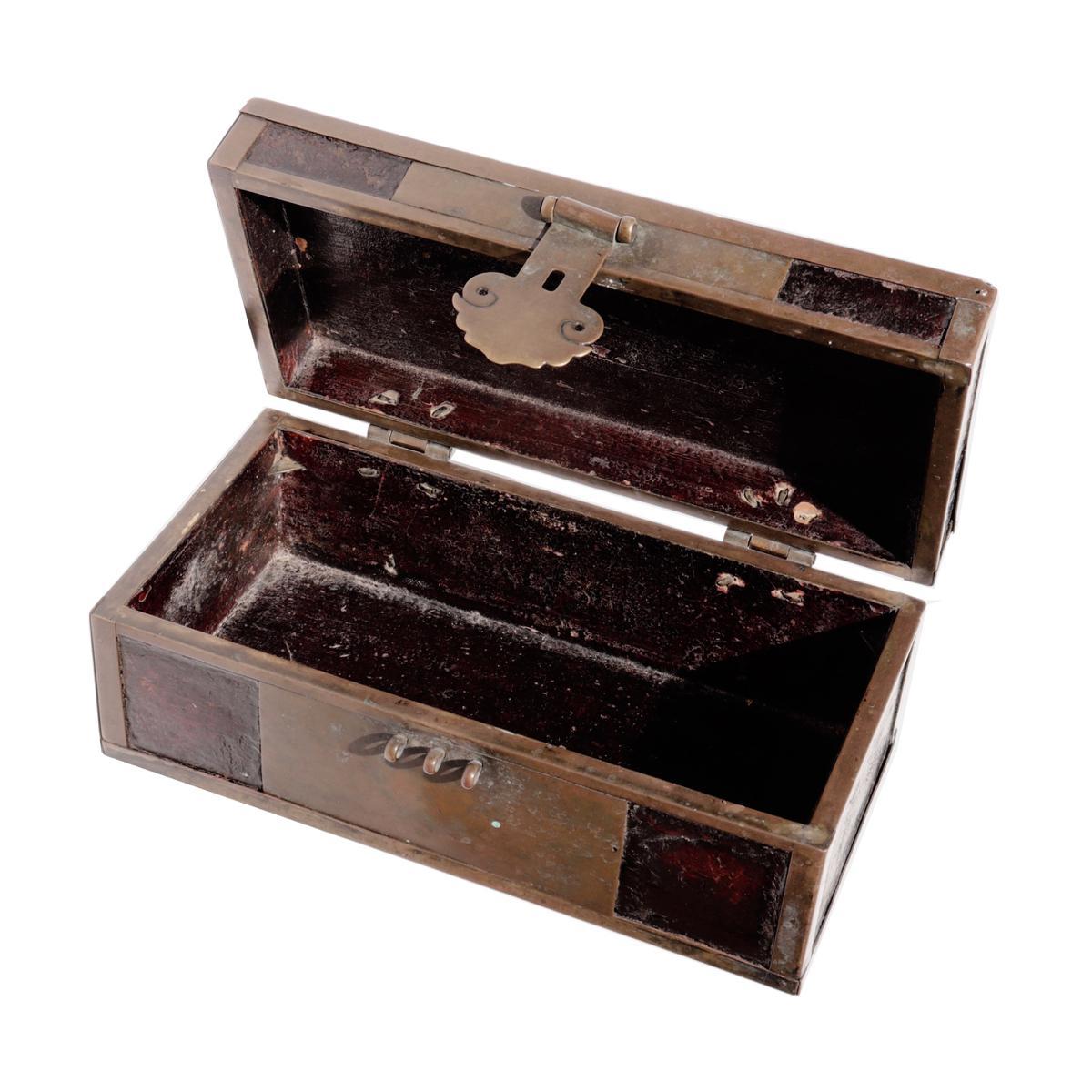 Chinese Brass and Lacquered Wood Box, simple wood box with a brass edgings and front lock plate, wood section covered in a dark lacquer, hinged top lid, front with large rectangular brass front plate with well-formed ling-chi shaped lock plate,