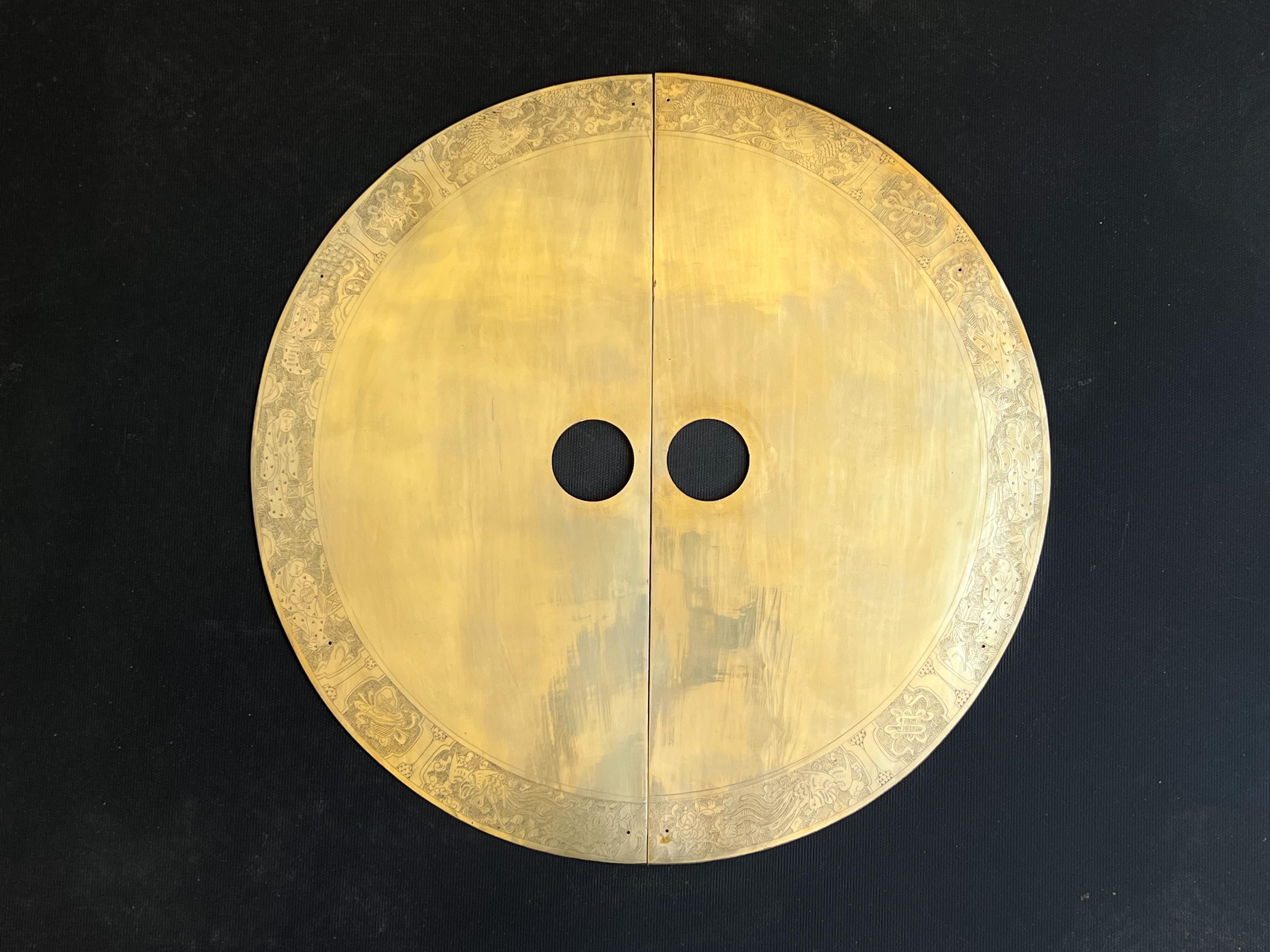 Cool 1960’s round solid brass entry door back plate with Chinese motif. 

In good original vintage condition, shows minor wear consistent with age. 
The indoor plate are lacquered the outdoor are not. They have small holes for small brass nails for