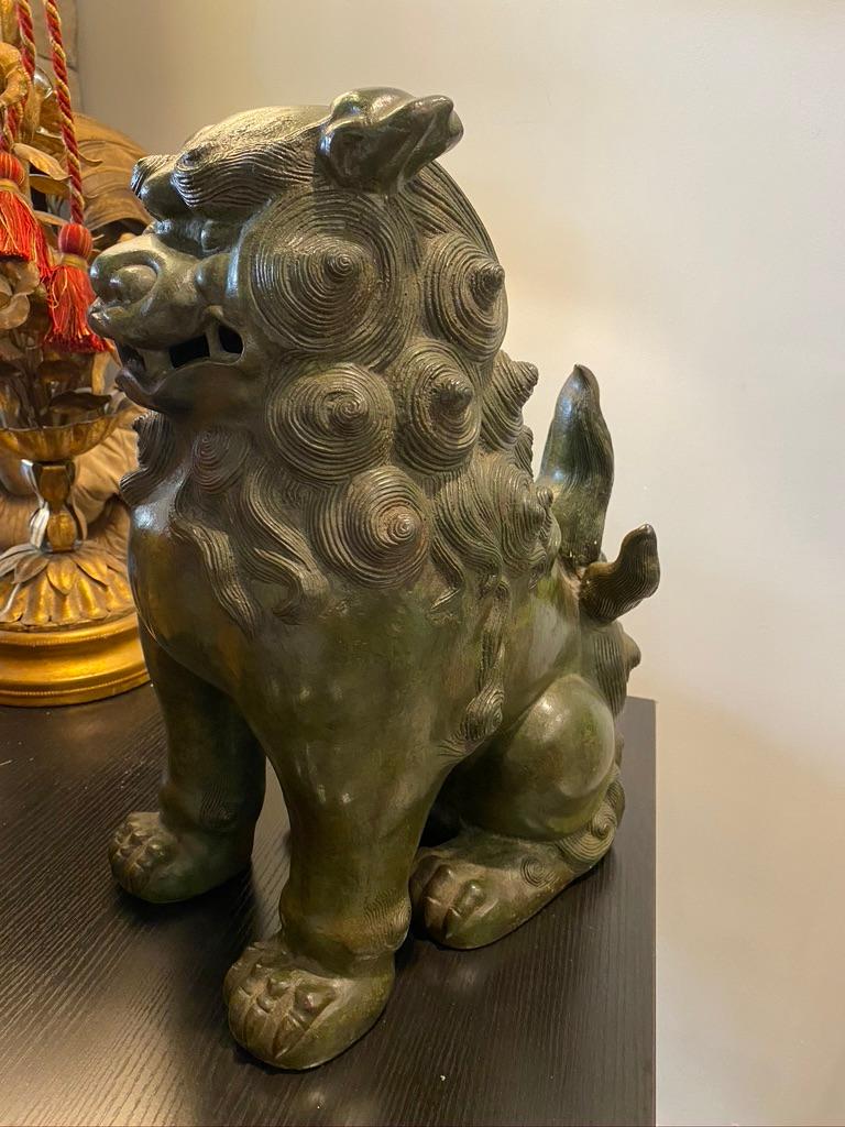 Large Chinese bronze foo dog
Marked and signed on underside came from Gaton lamps designer of White House with Jackie Kennedy Well cast! Mouth open to frighten Evil Spirits away.