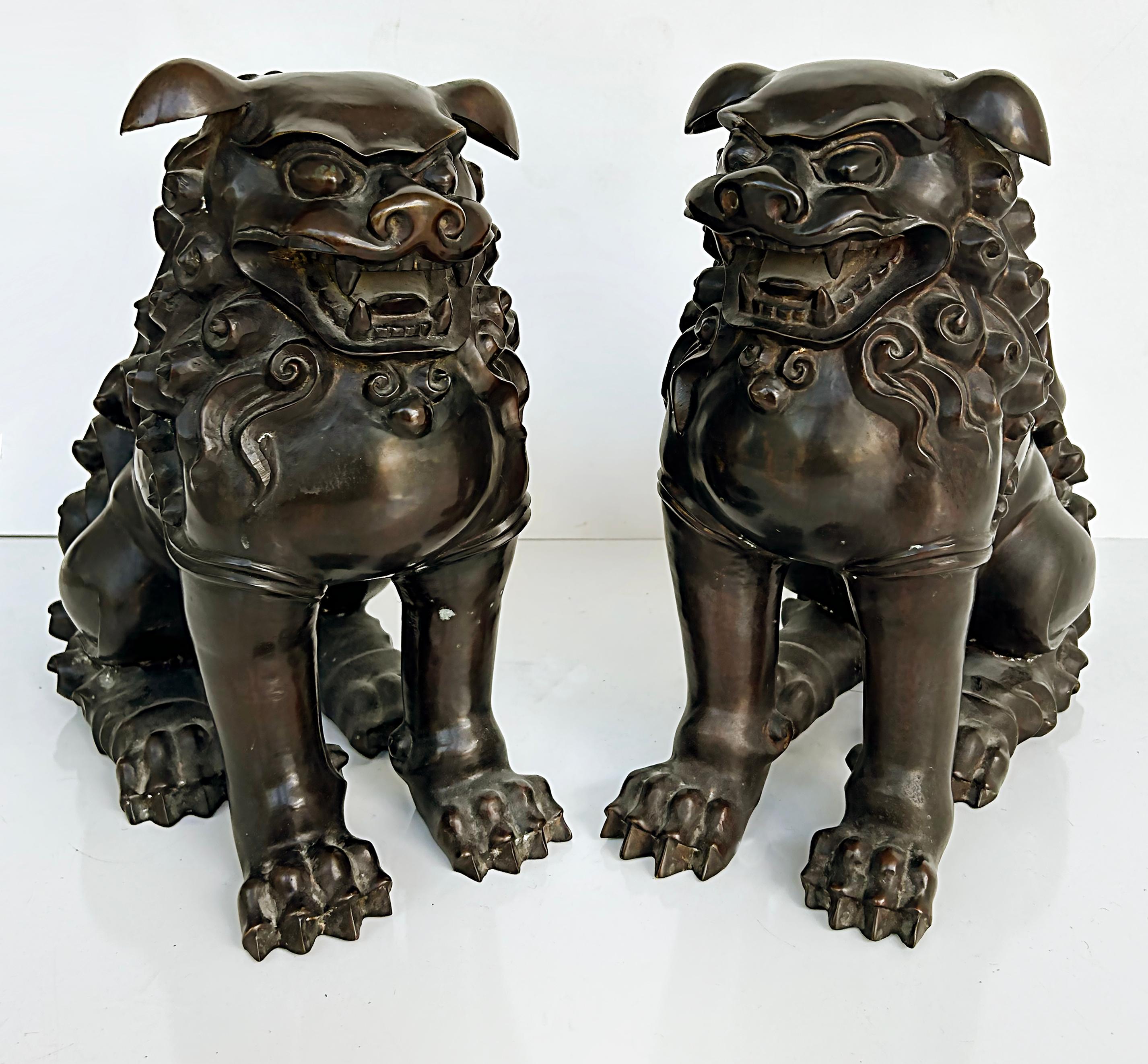 20th Century Chinese Bronze Foo Dogs Sculptures, a Pair