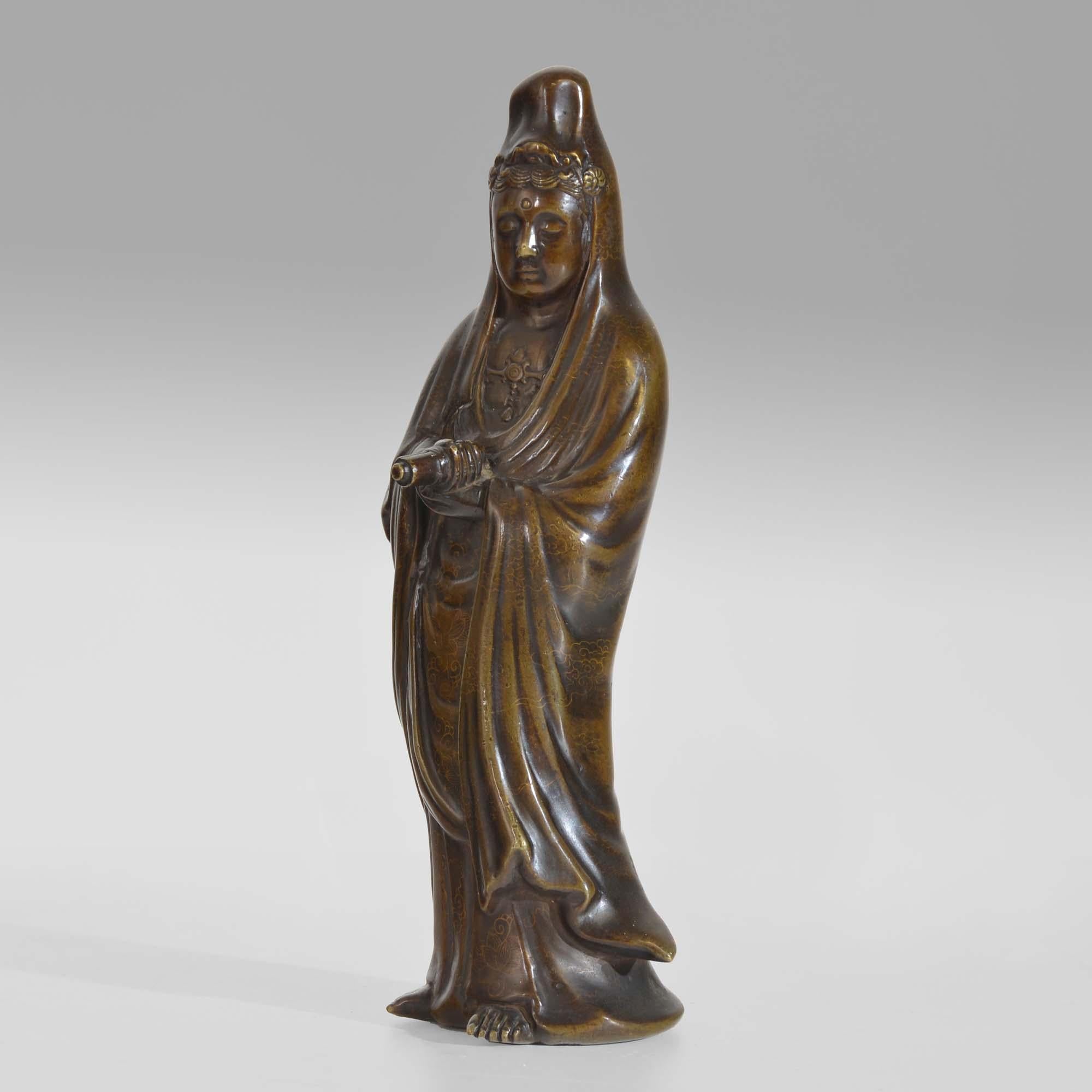 Chinese bronze statue of Guanyin
Gilt bronze statue of the Buddhist bodhisattva, Guanyin. Known as the Goddess of Mercy in English, she is associated with compassion and her Chinese name means ‘the one who perceives the Sounds of the World’. Holding