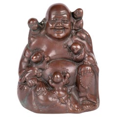 Chinesischer bronzierter sitzender Buddha mit Jungen