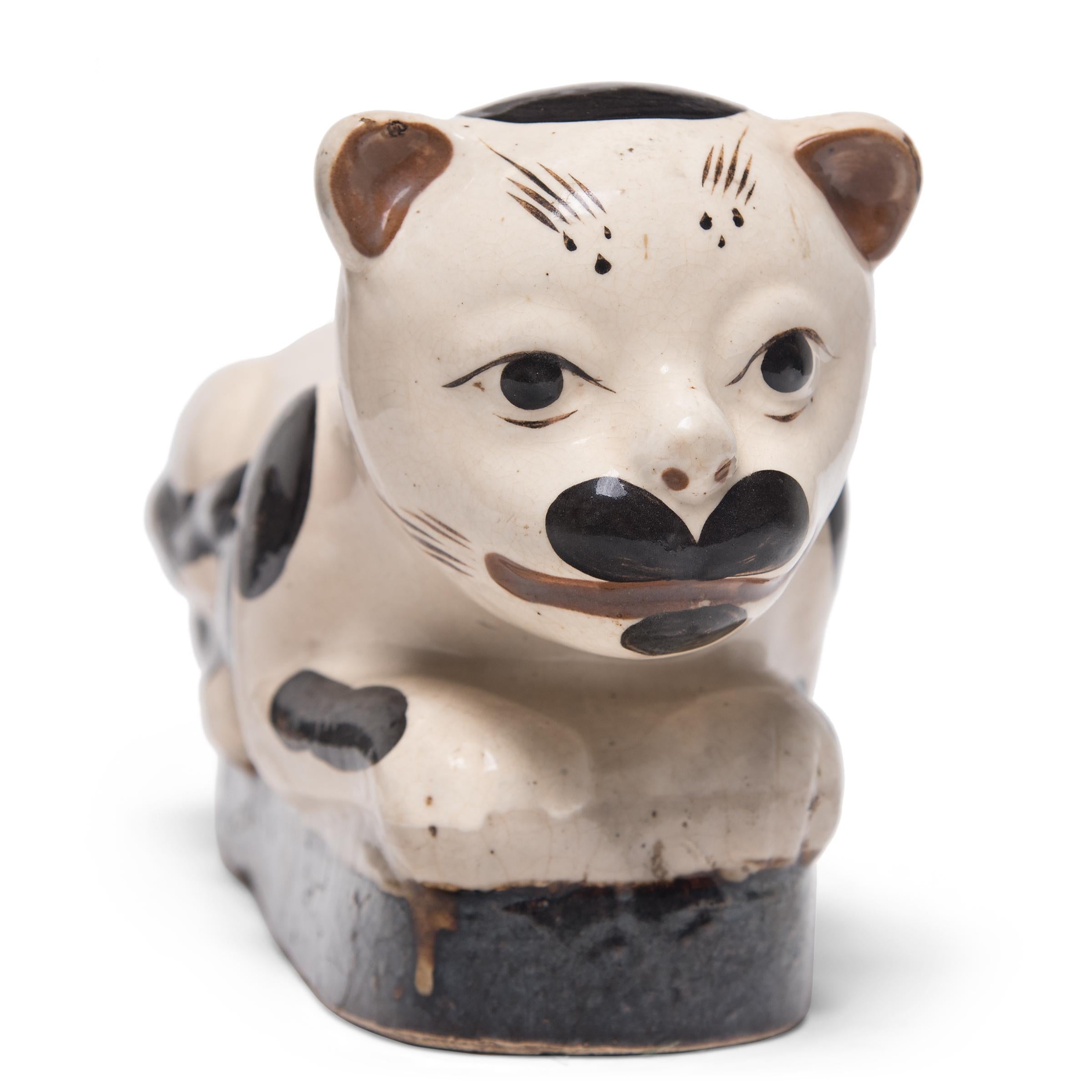 Glazed Chinese Brown and White Cat Headrest, circa 1900 For Sale