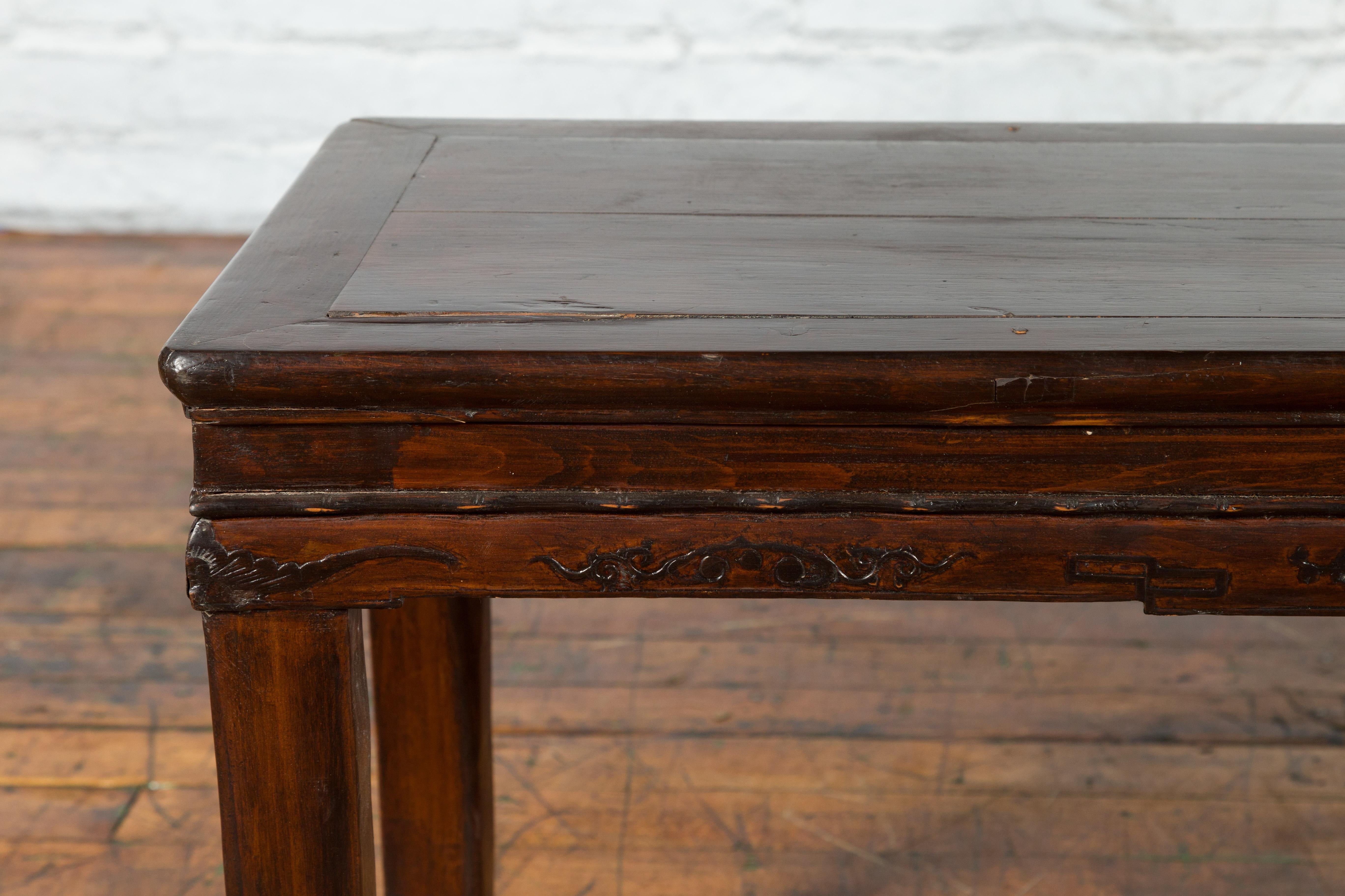 Wood Chinese Brown Side Table from the Qing Dynasty with Foliage-Carved Motifs For Sale
