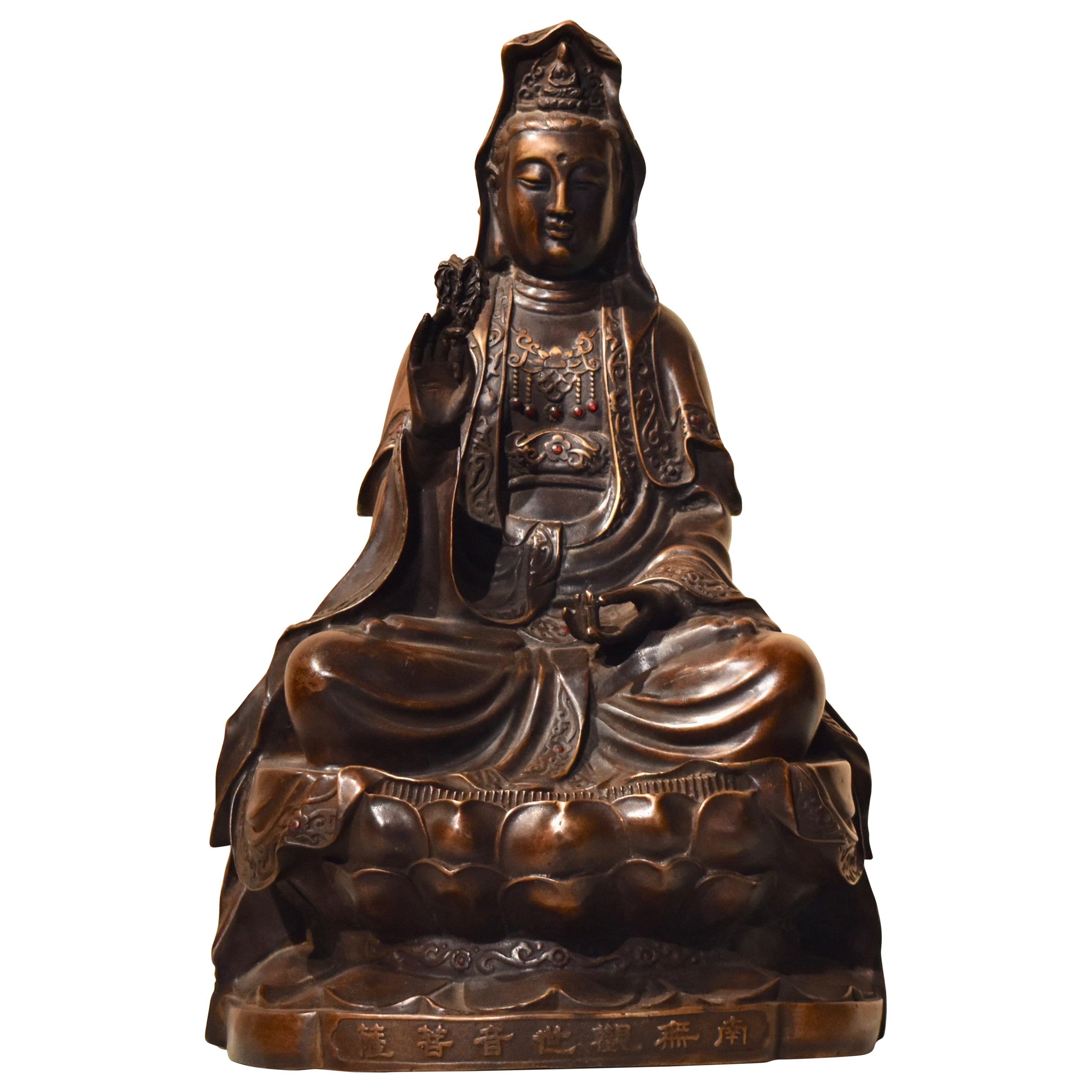 Chinese Buddha Sculpture in Bronze with Red Stones and Inscription For Sale