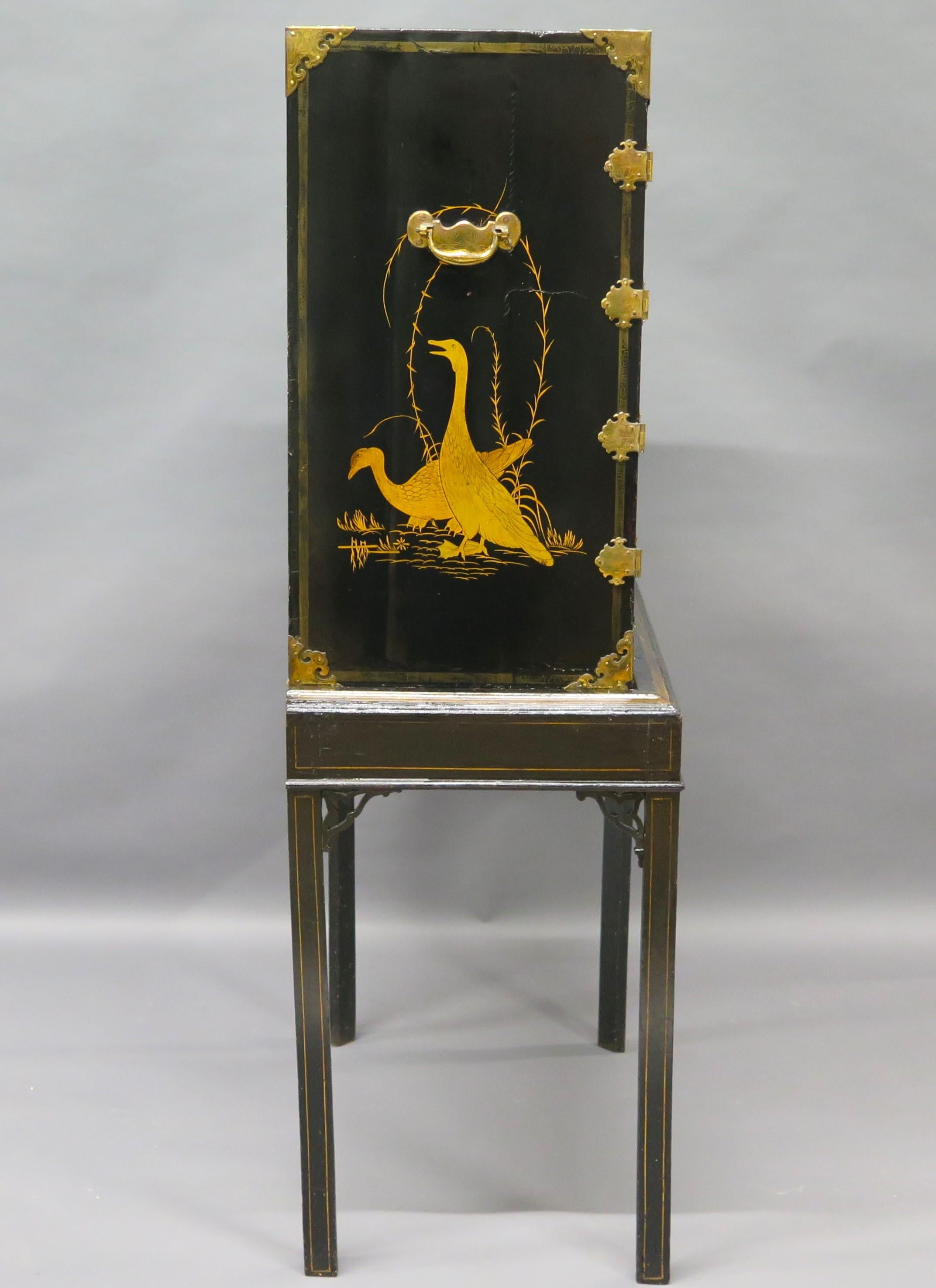 Opulent Black Lacquer Chinese Export Collector's Cabinet on Stand In Good Condition For Sale In Dallas, TX