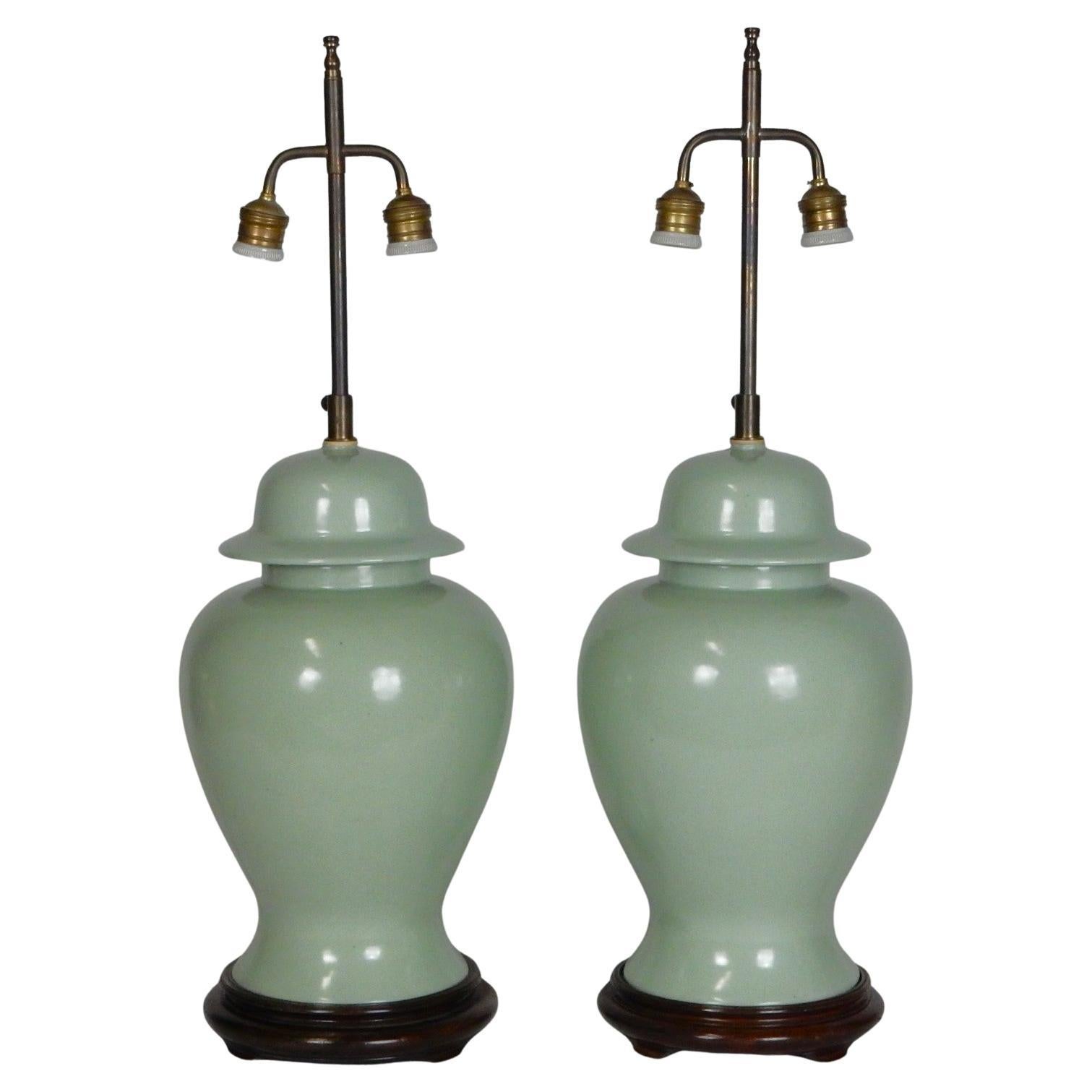 Sunning pair of vintage porcelain Caledon glaze ginger jar lamps with original shades.
These are LARGE lamps with adjustable shade height. As shown 34